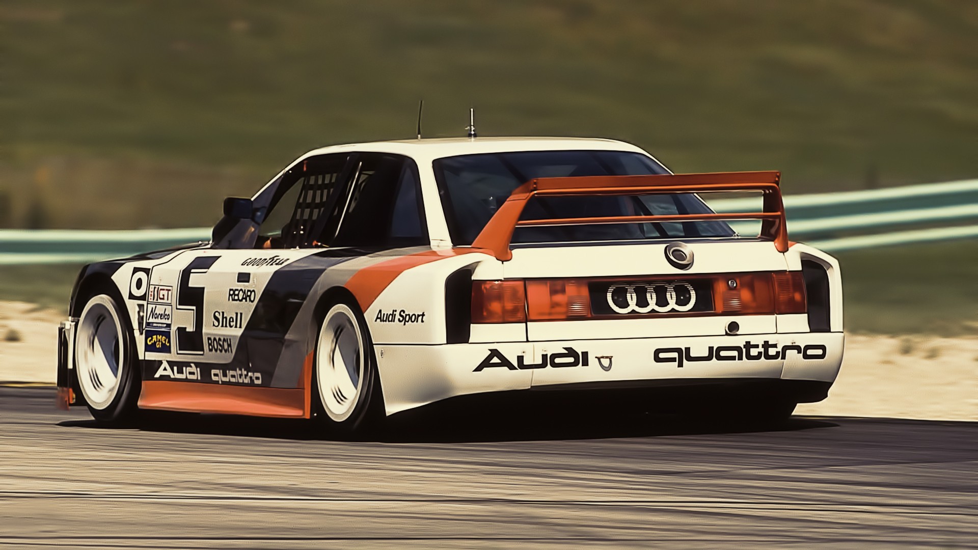 Audi Quattro race car on a track HD Wallpaper