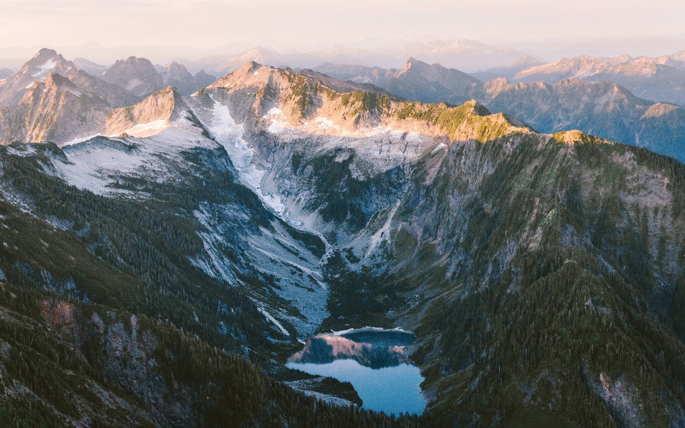Mountain range with a lake and snow HD Wallpaper