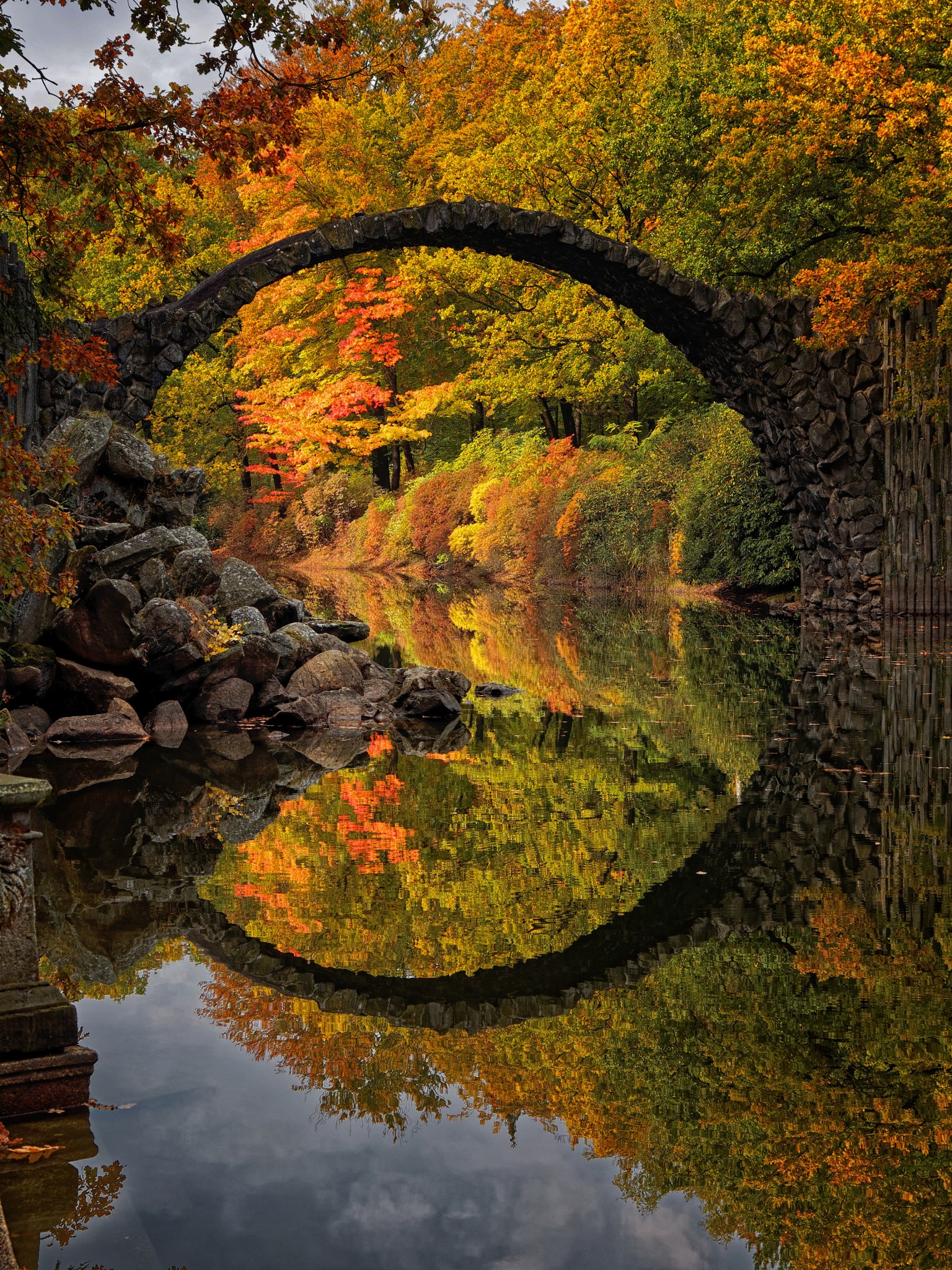 Rakotzbrücke bridge in Germany during fall with reflection HD Wallpaper