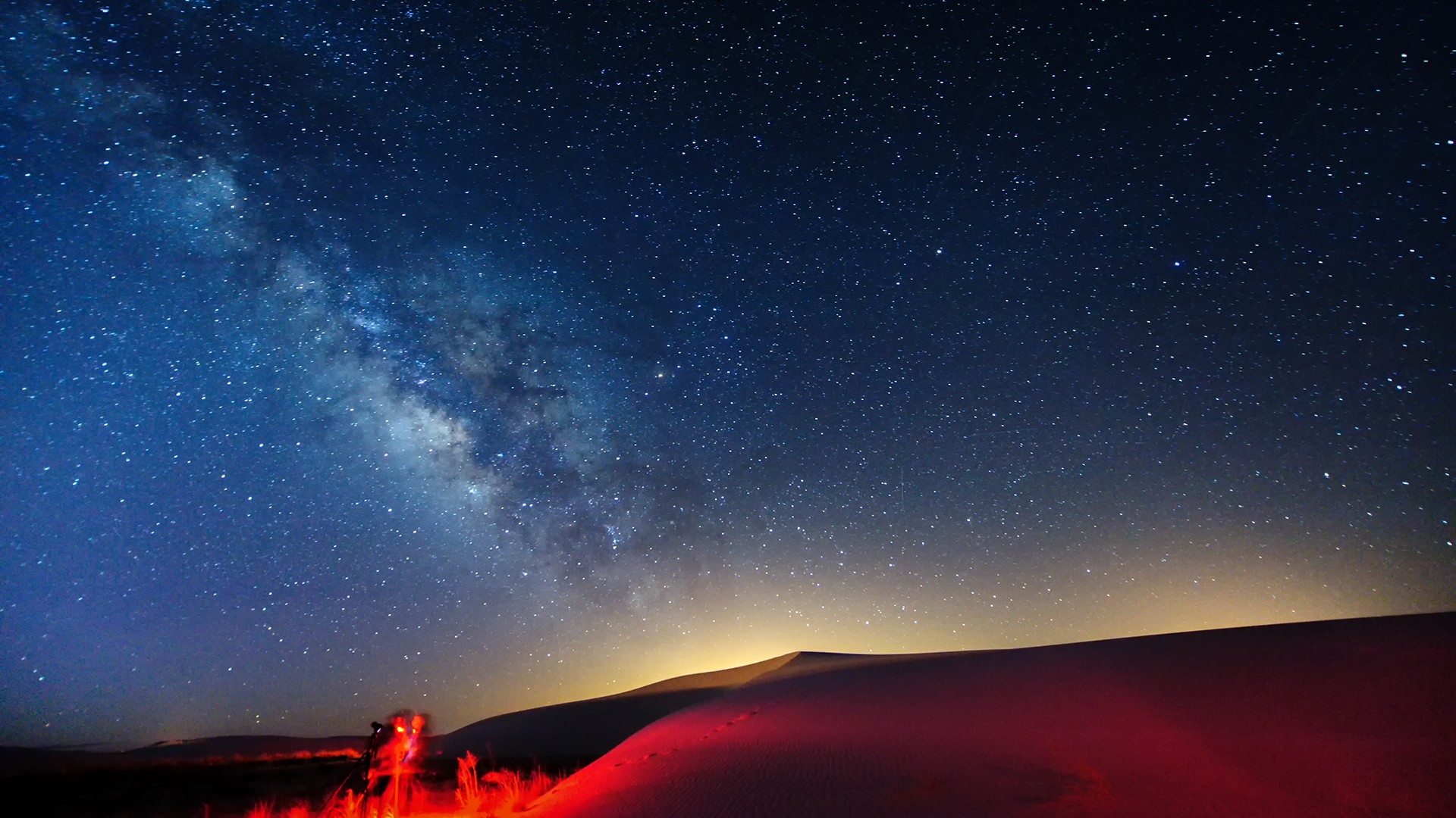 Milky Way over desert dunes at night HD Wallpaper