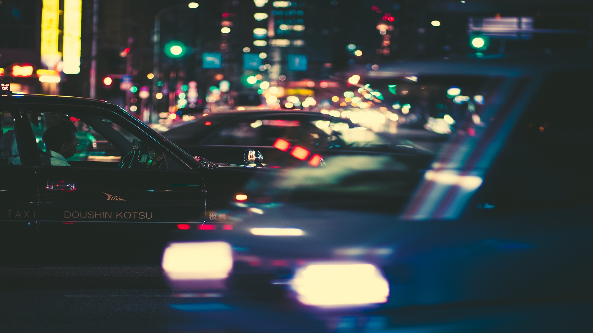 Doushin Kotsu Taxi Driving Through City at Night HD Wallpaper