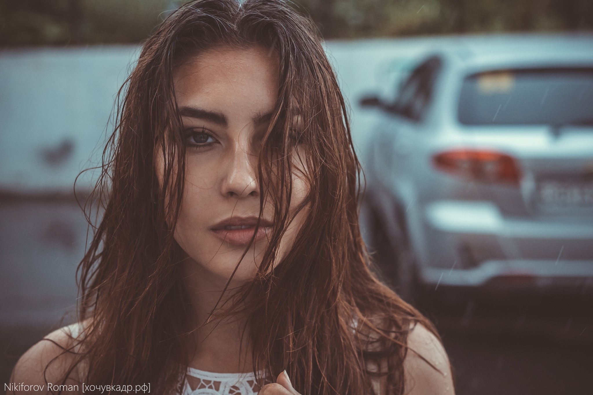 Portrait of a woman with wet hair in the rain HD Wallpaper