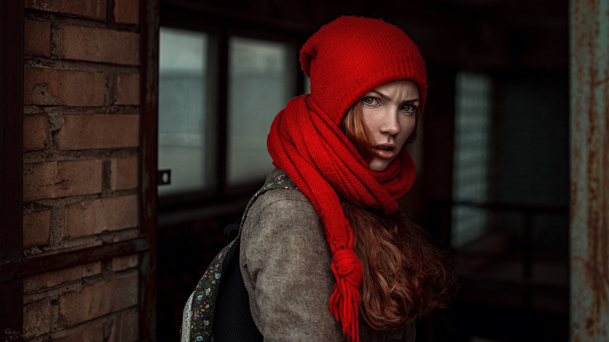 Oksana Butovskaya wearing a red hat and scarf HD Wallpaper