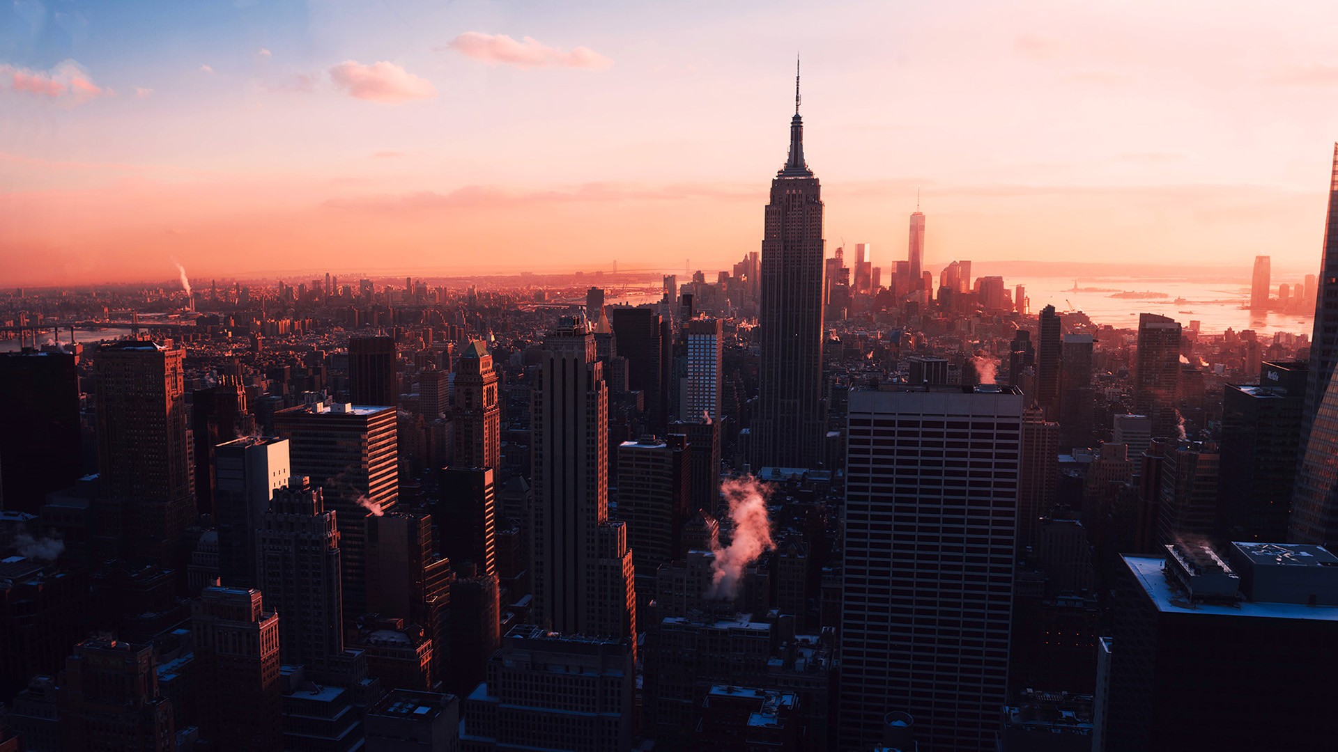 New York City skyline at sunset with Empire State Building HD Wallpaper