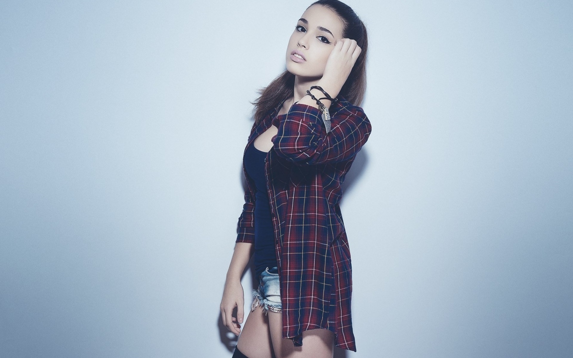 Woman in plaid shirt and jean shorts HD Wallpaper