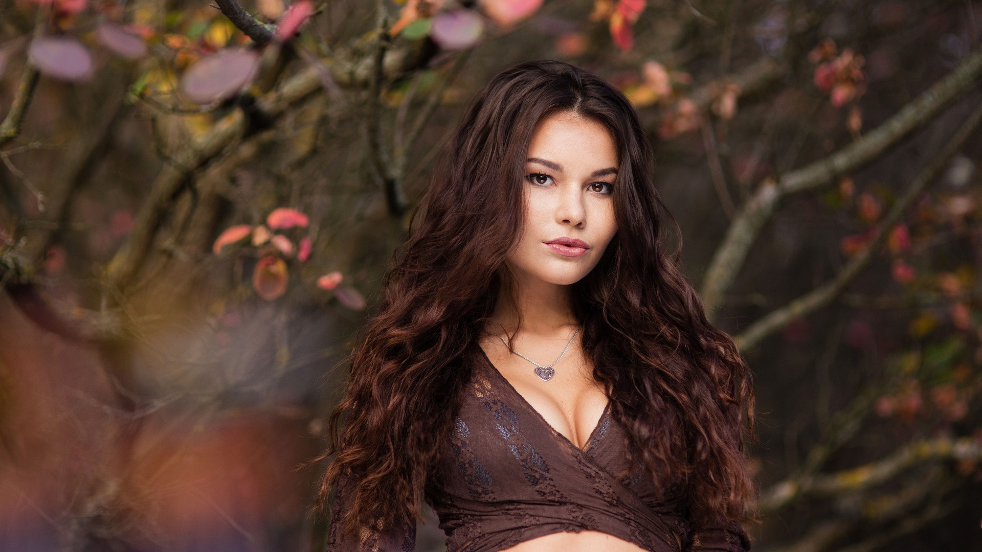 wavy hair, cleavage, looking at viewer, fall, long hair, depth of field, open mouth, women outdoors, women, brown eyes, nature, bokeh, brunette, portrait, model, face, leaves, trees HD Wallpaper