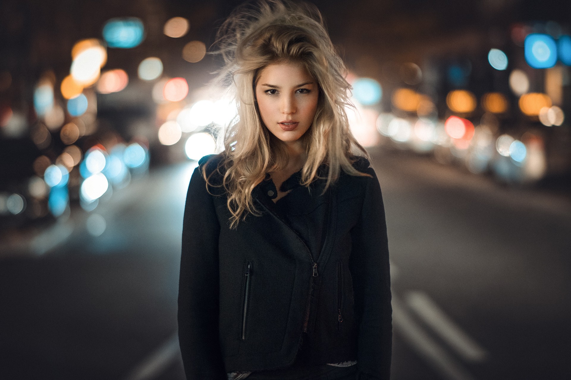 Woman with blonde hair on a city road at night HD Wallpaper
