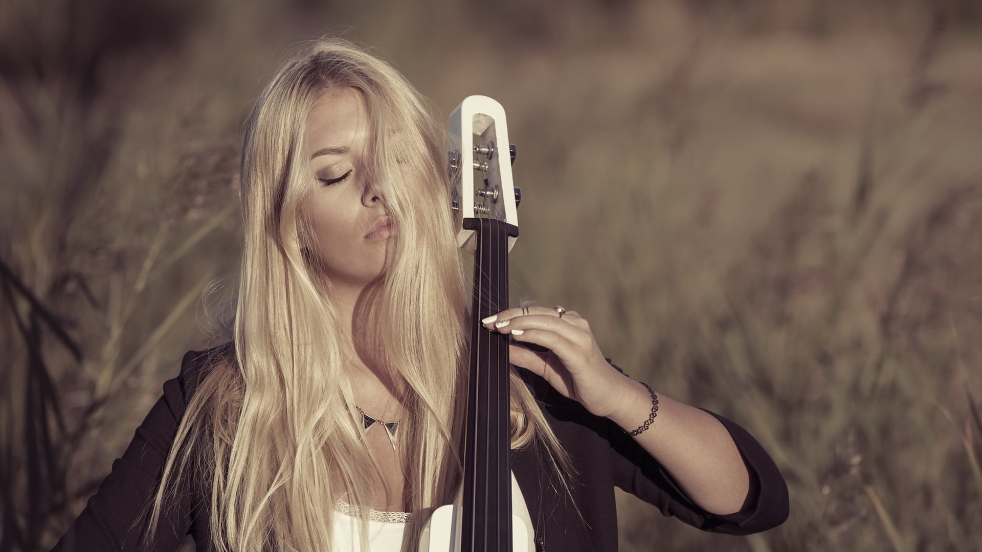 Woman playing a contrabass in a field HD Wallpaper