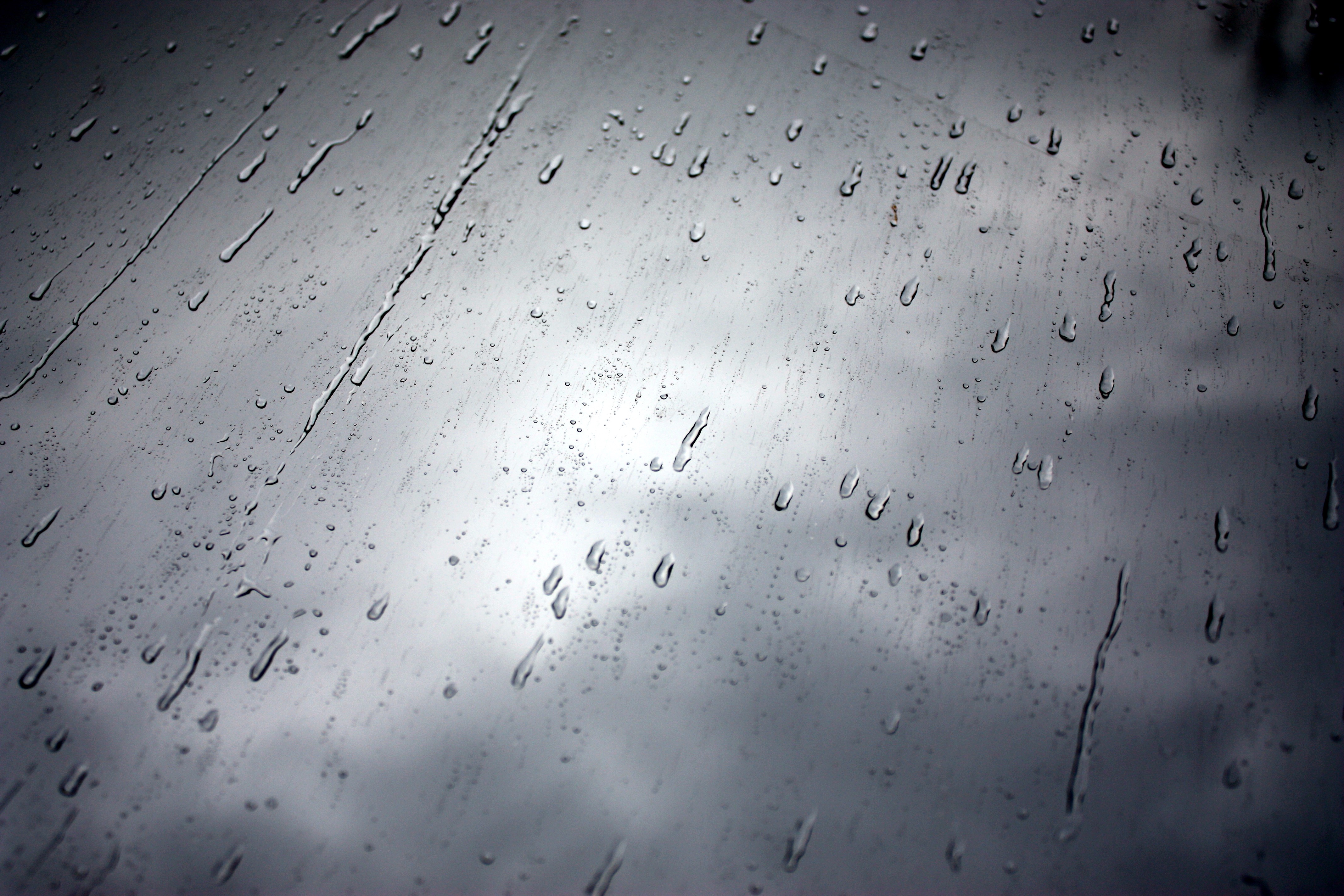 Raindrops on a window pane HD Wallpaper