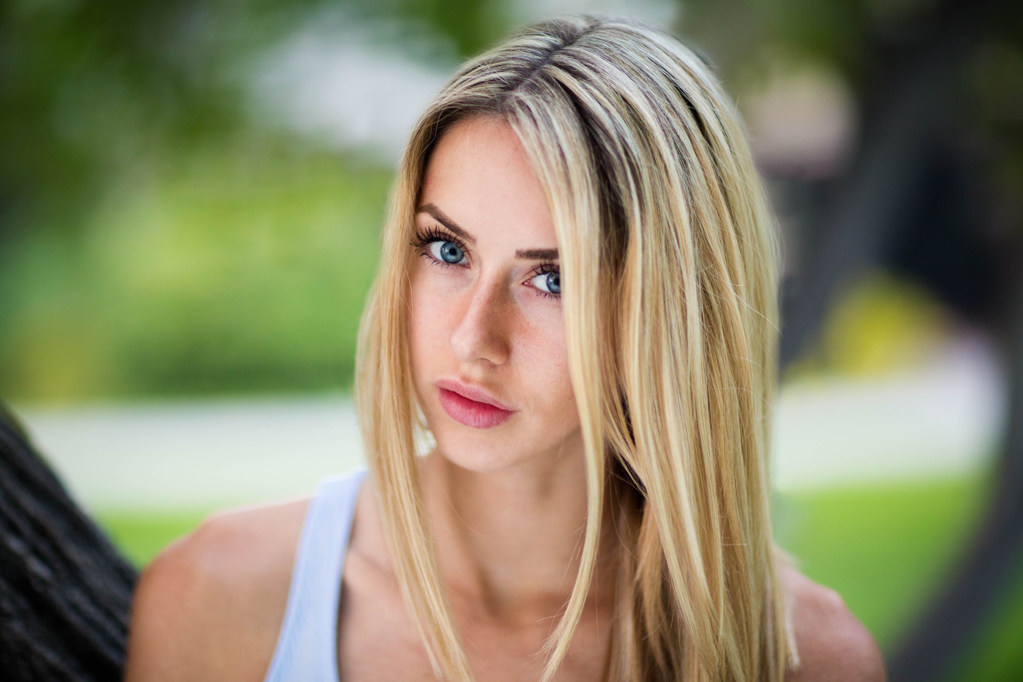 Portrait of a blonde woman with blue eyes HD Wallpaper