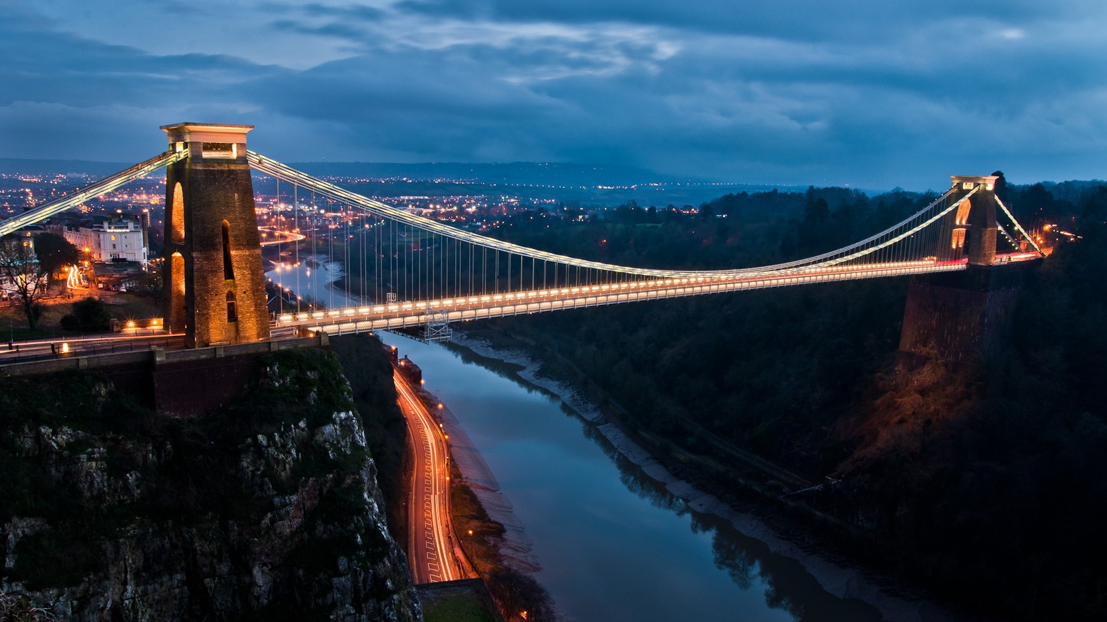 Clifton Suspension Bridge at dusk with city lights HD Wallpaper