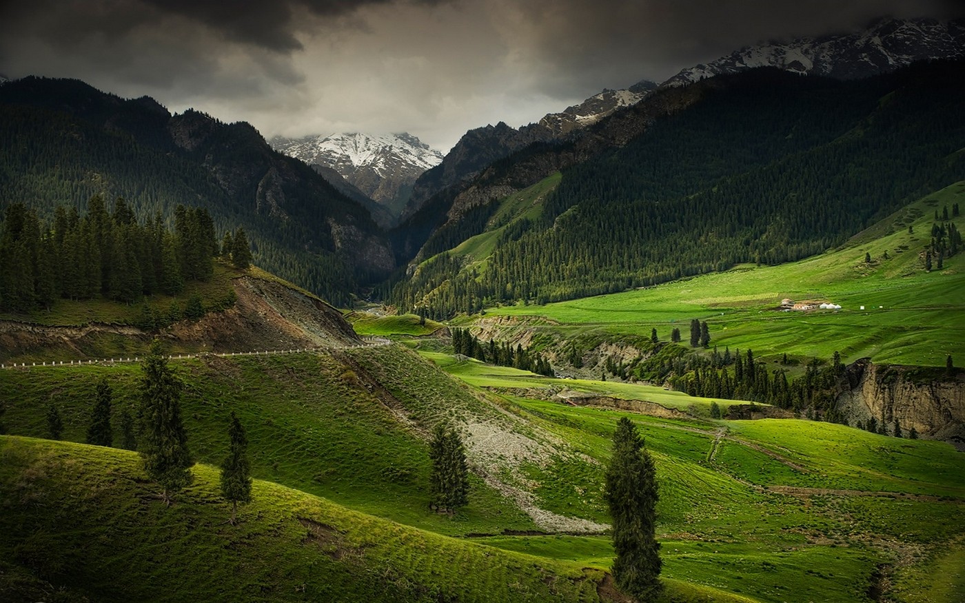 Green valley with mountains and snowy peaks in China HD Wallpaper