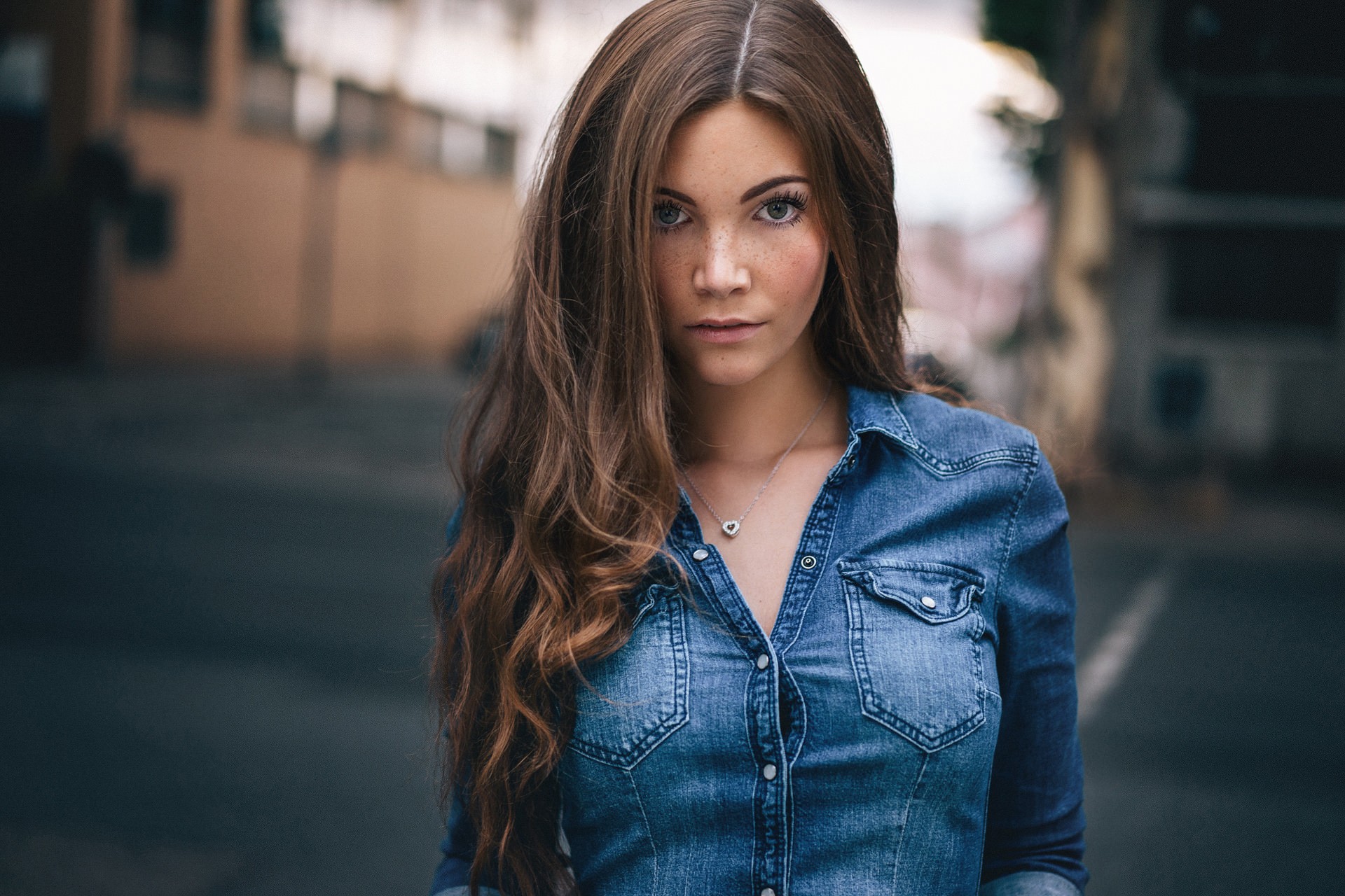 Woman in denim shirt with heart necklace HD Wallpaper