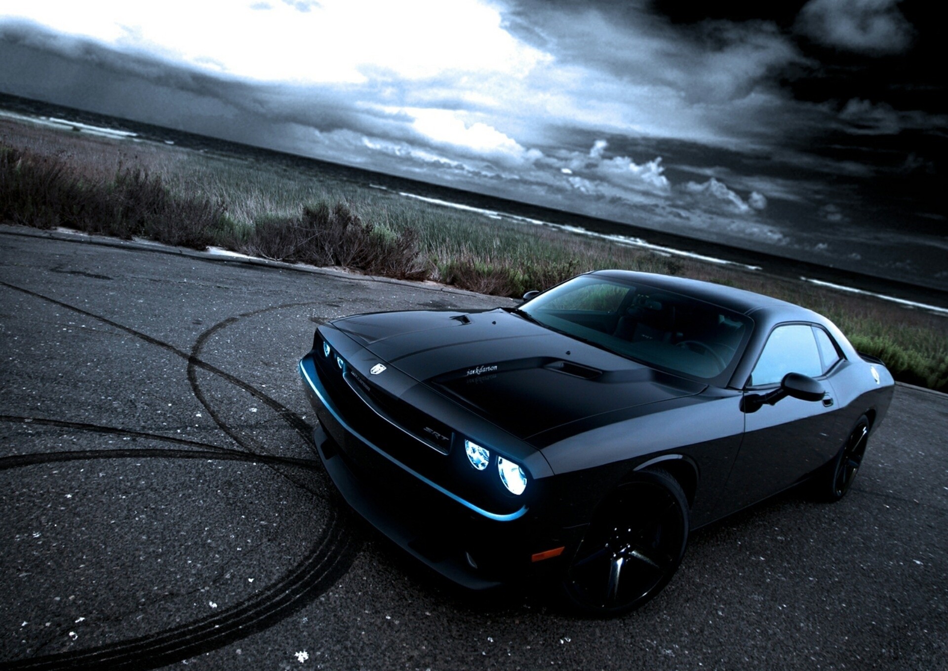Black Dodge Challenger SRT on a road with tire marks HD Wallpaper