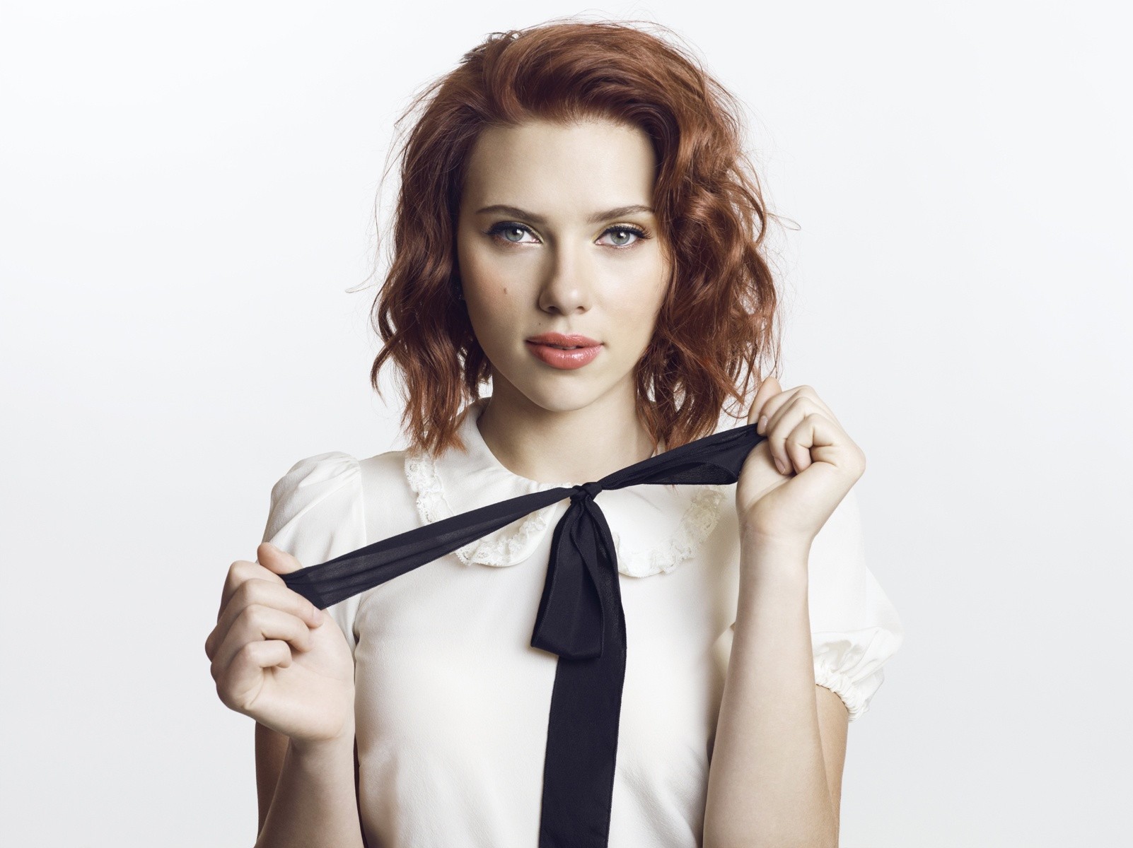 Scarlett Johansson in a white blouse with a black bow HD Wallpaper