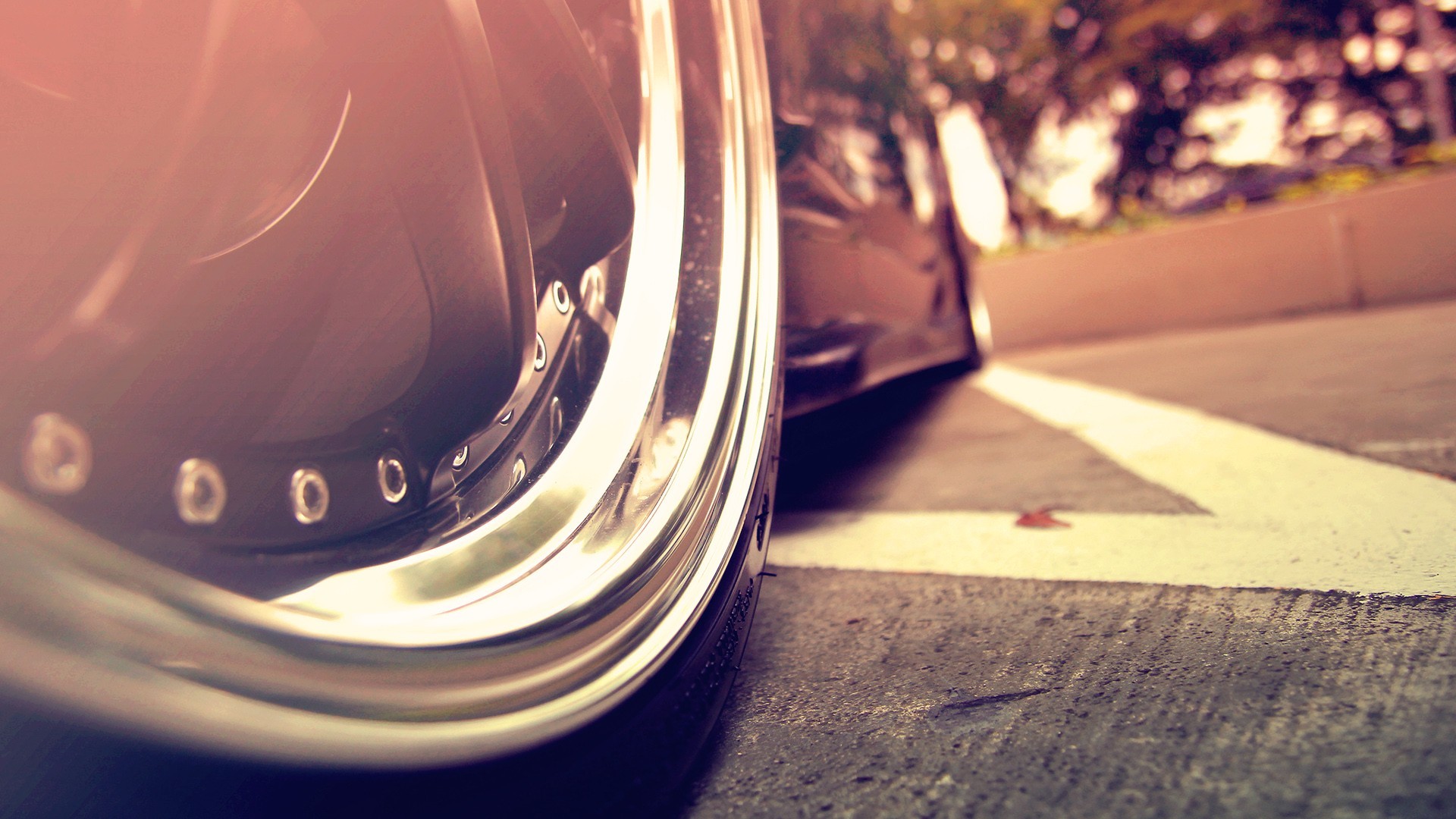 Close-up of a shiny car wheel and tire HD Wallpaper