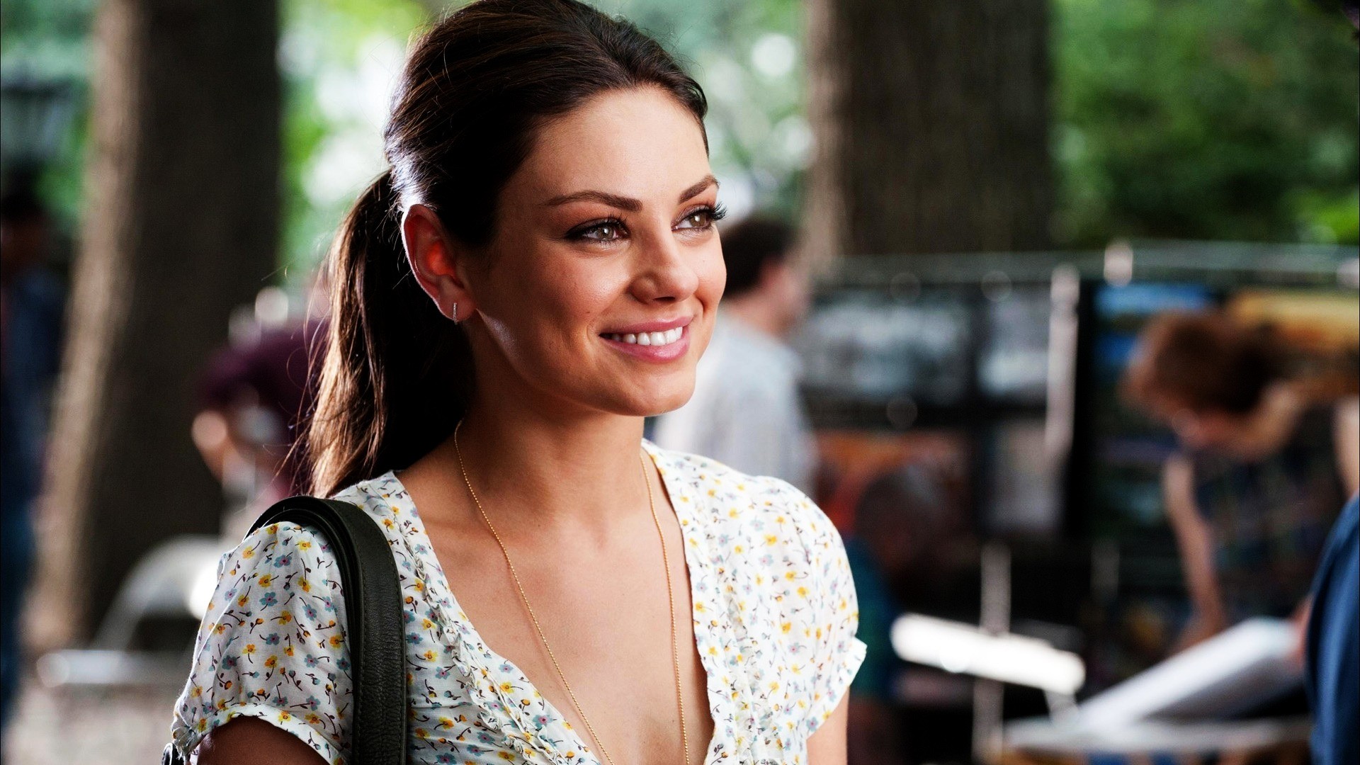 Mila Kunis smiling outdoors HD Wallpaper