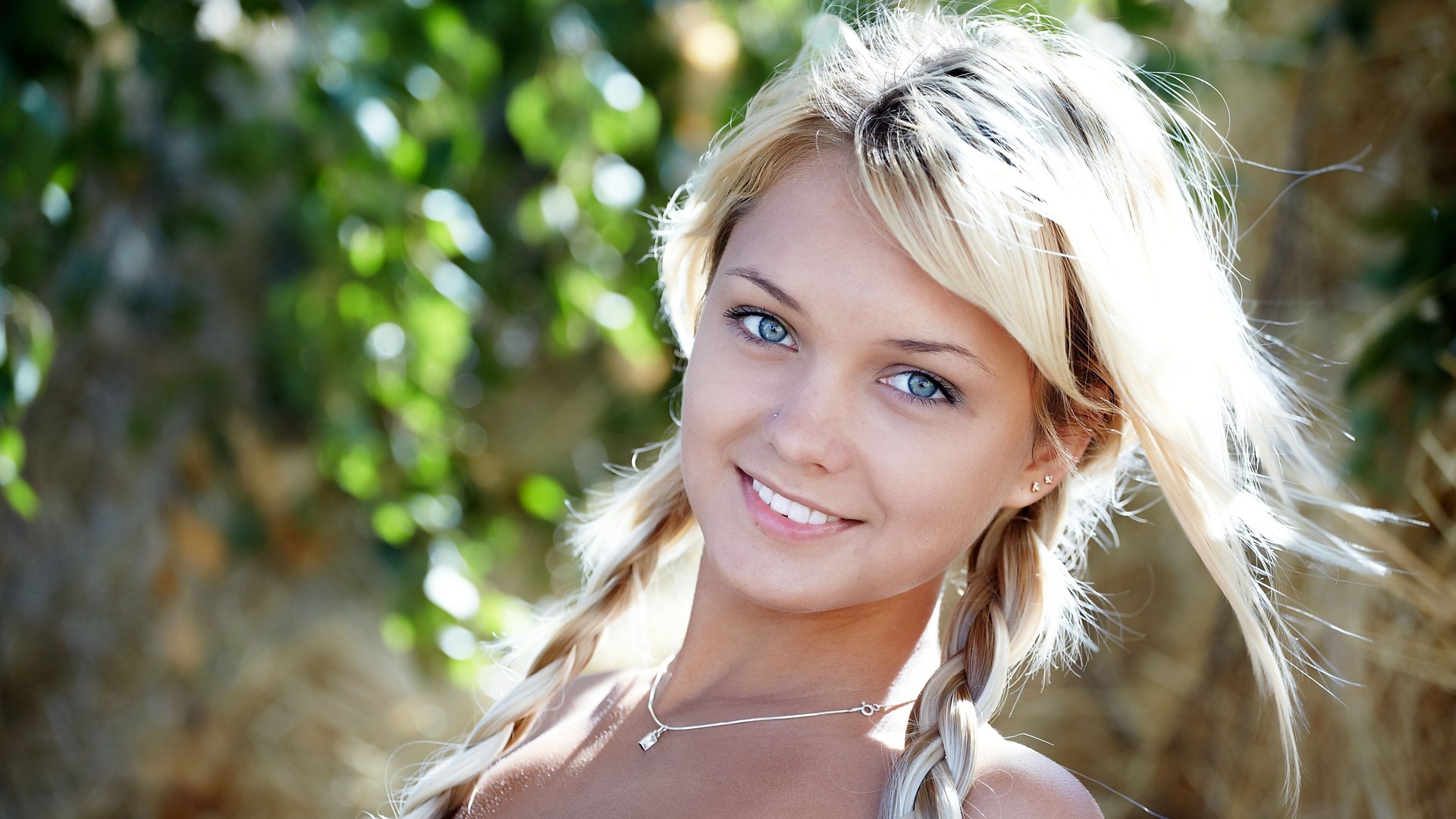 Portrait of Lada D with blonde hair and blue eyes HD Wallpaper