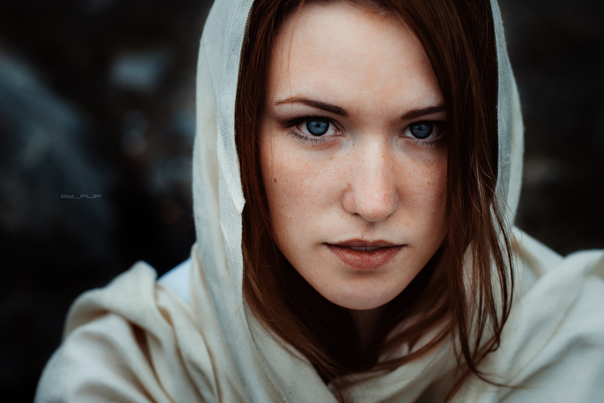 Woman with blue eyes wearing a hood HD Wallpaper