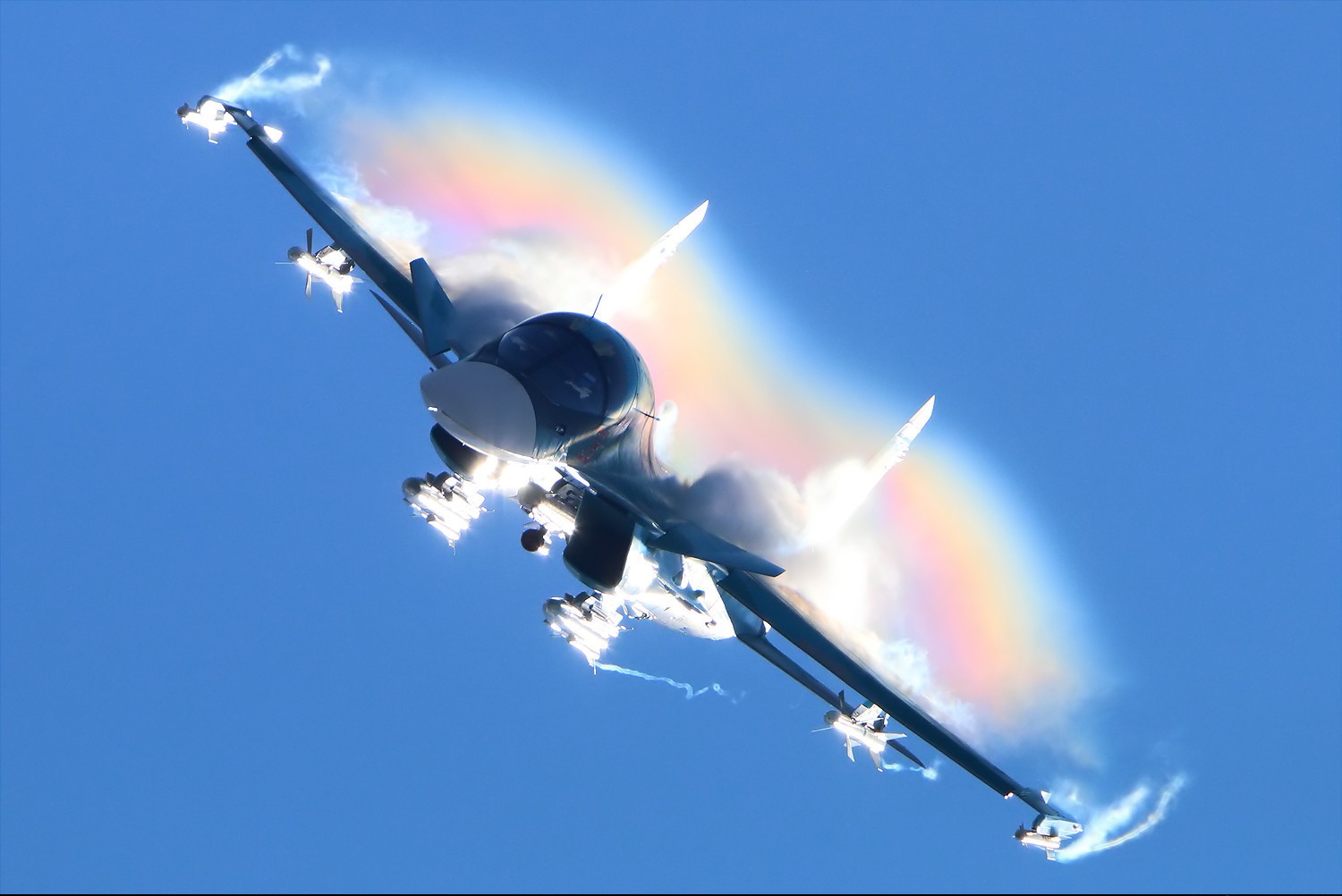 Sukhoi Su-34 fighter jet with rainbow contrails HD Wallpaper