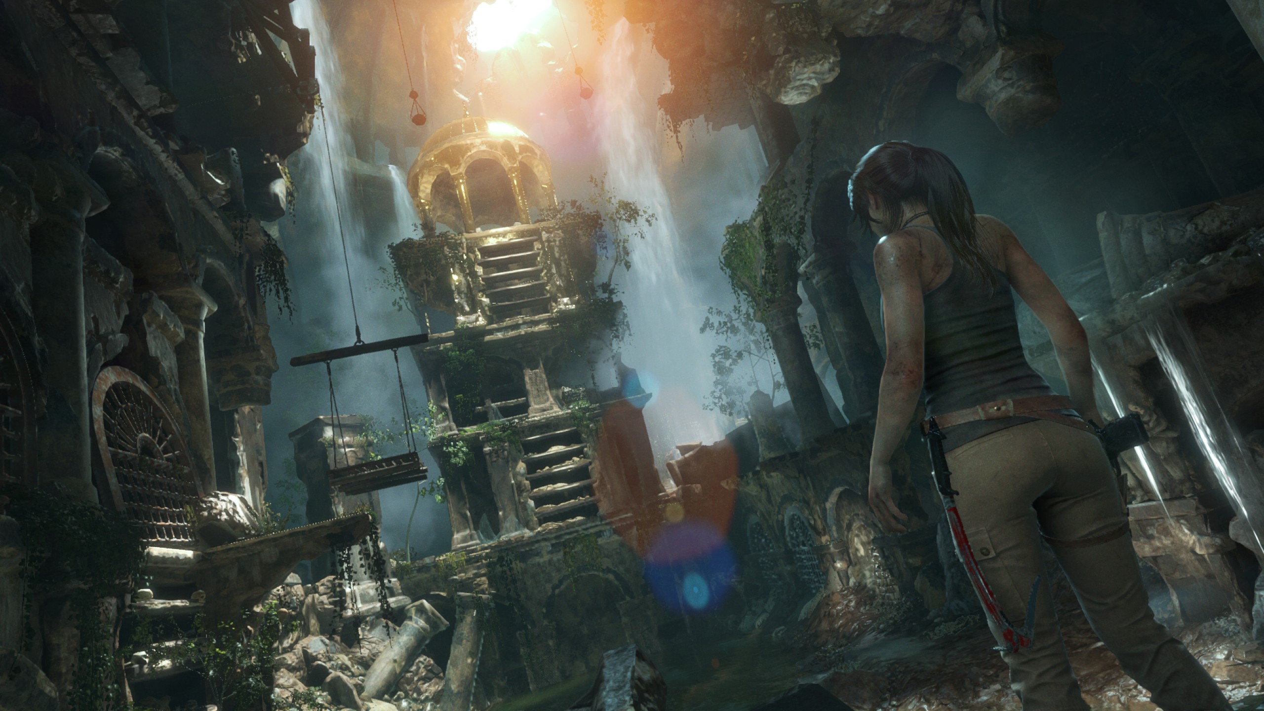 Lara Croft in a jungle ruin with waterfalls HD Wallpaper