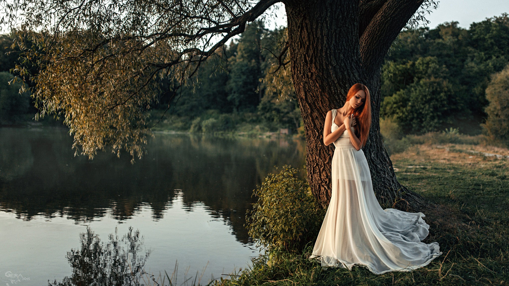 Woman in white dress by a tree near a lake HD Wallpaper