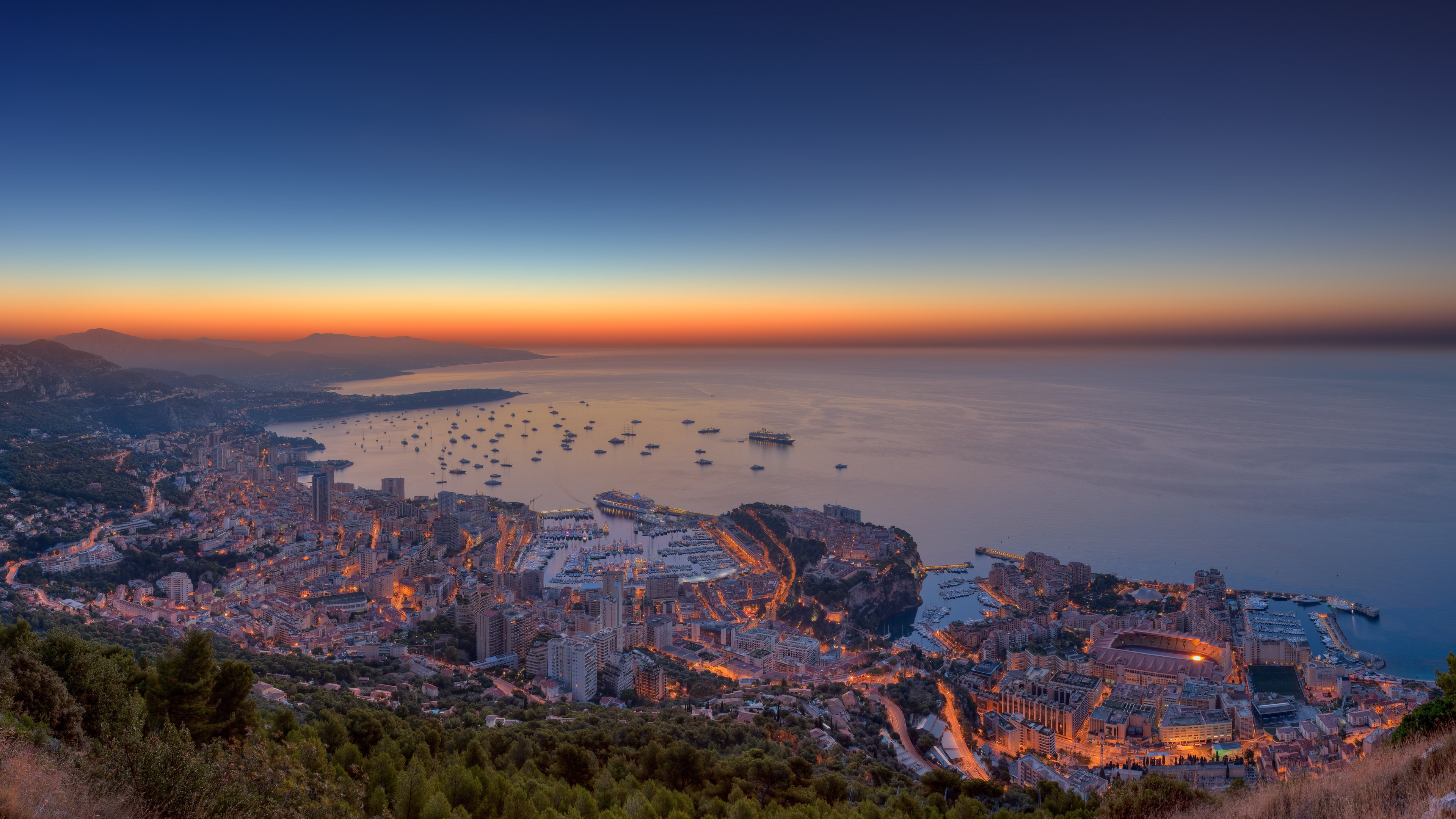 Monaco cityscape at sunset overlooking the sea HD Wallpaper