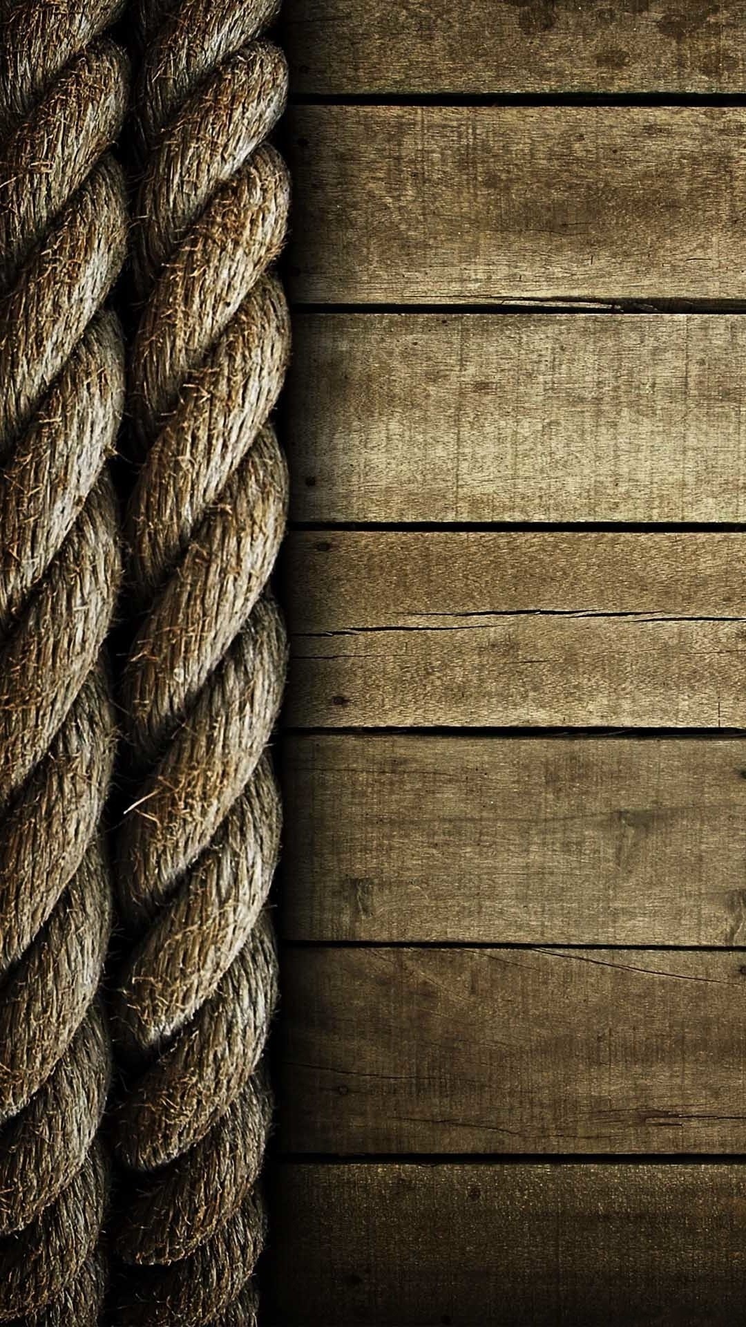 Thick rope on a wooden surface HD Wallpaper
