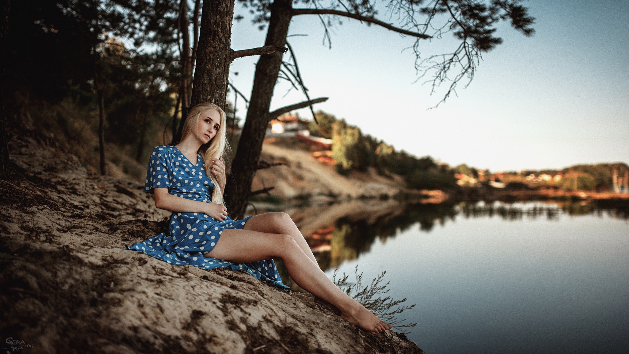 Woman in blue polka dot dress by the lake HD Wallpaper
