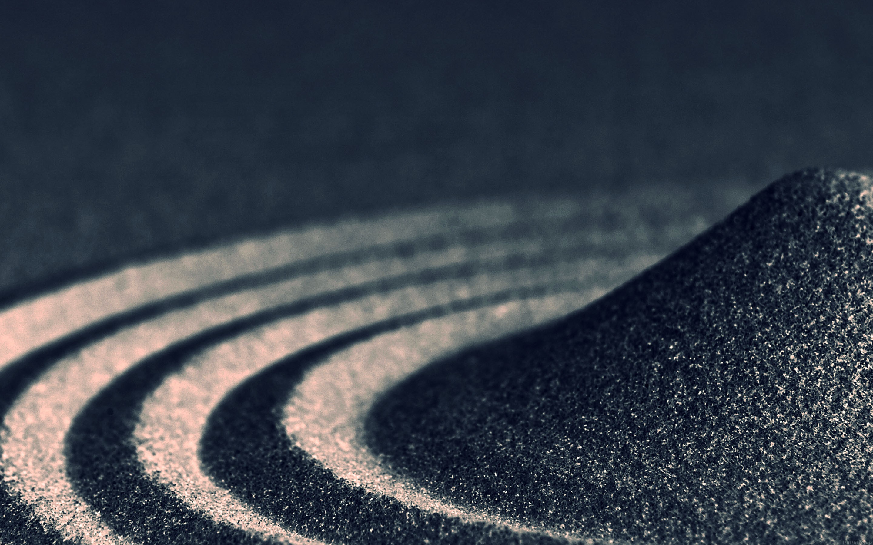 Zen sand garden with raked patterns HD Wallpaper