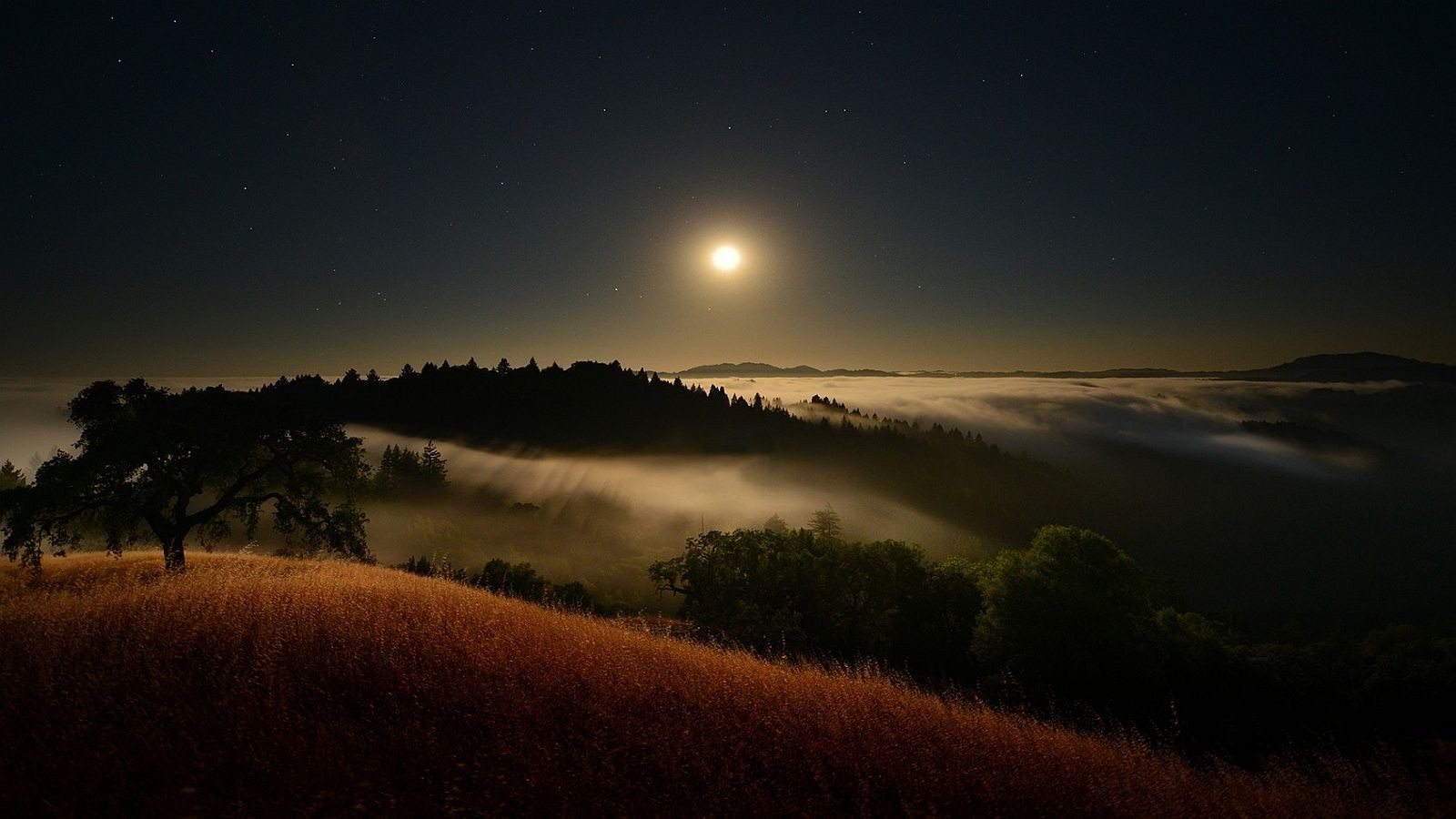 Moonlit Foggy Mountains with Stars HD Wallpaper