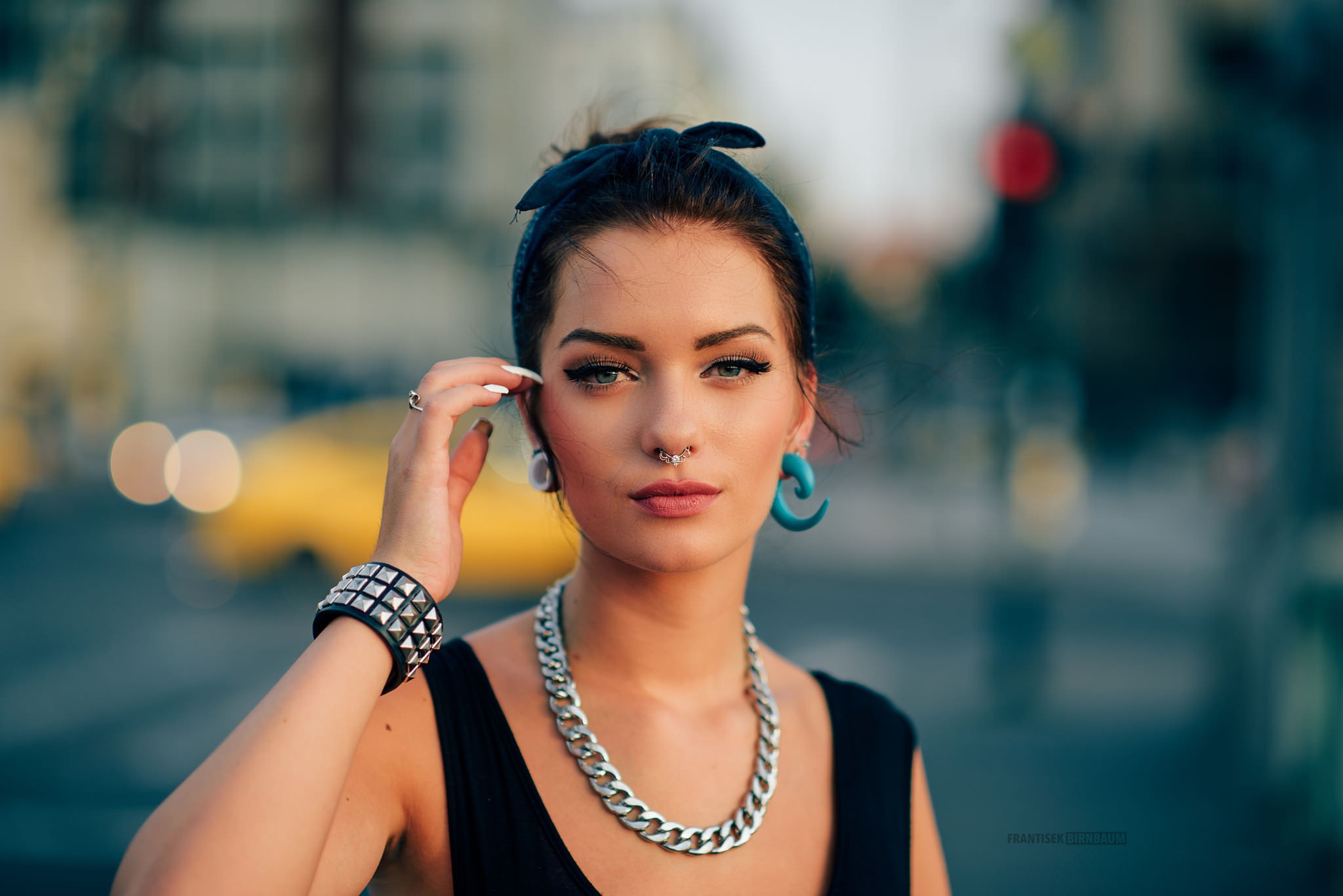 Woman with nose ring and large earrings HD Wallpaper