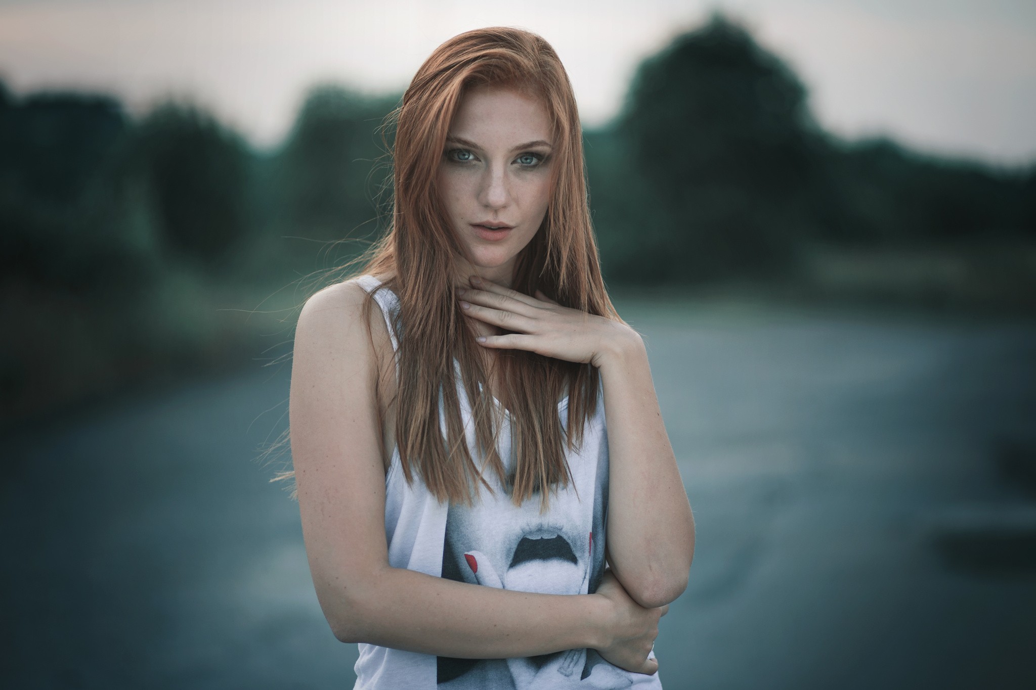 Redhead woman with hand on neck HD Wallpaper