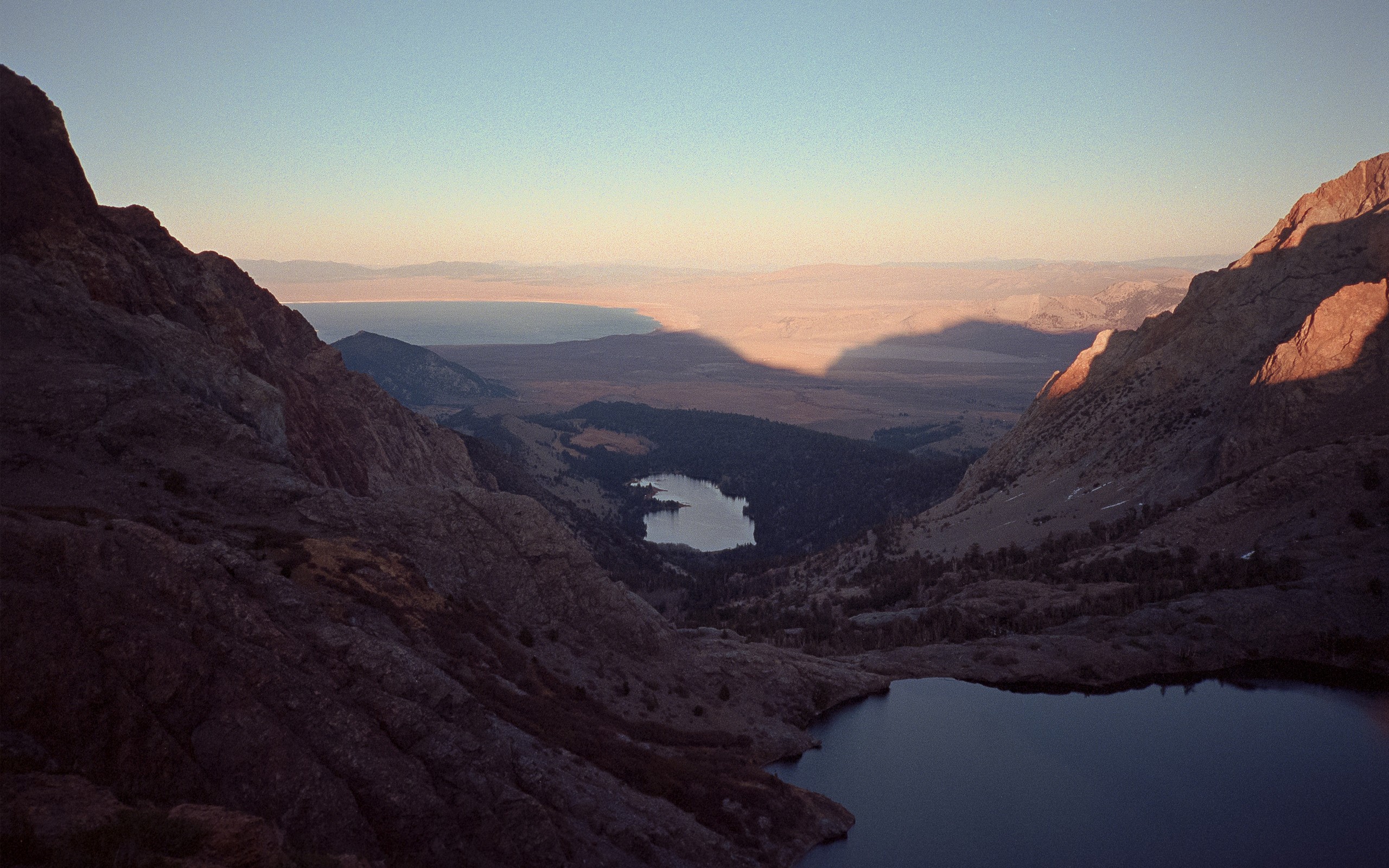 Mountains and lakes at sunset with shadows HD Wallpaper