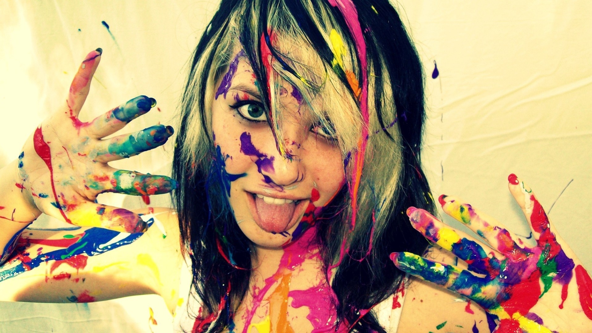 Woman covered in colorful paint splatters HD Wallpaper