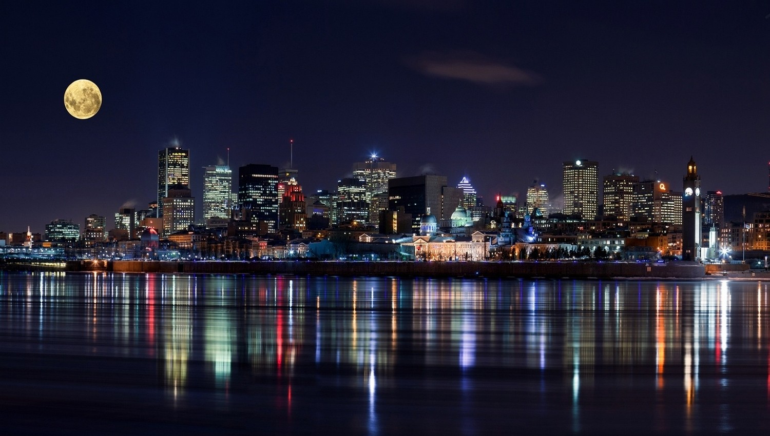 Montreal cityscape at night with a full moon HD Wallpaper