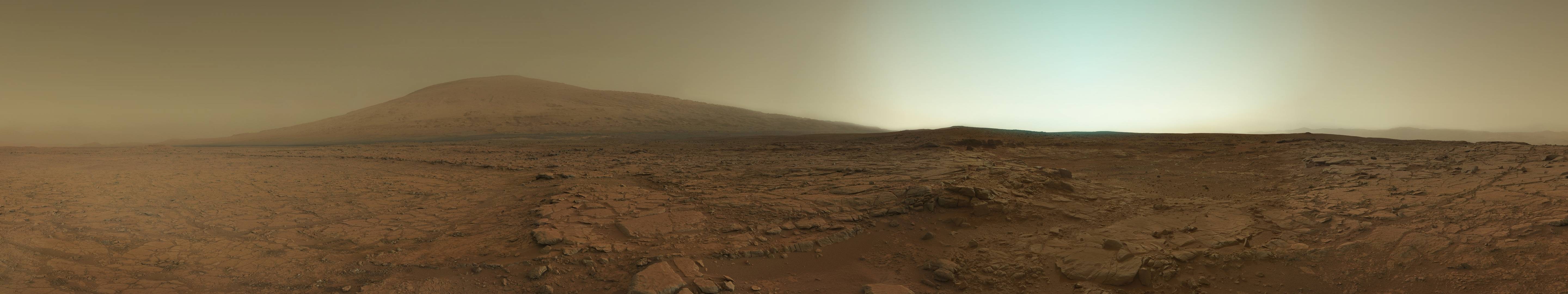 Mars landscape with a large mountain and rocky terrain HD Wallpaper