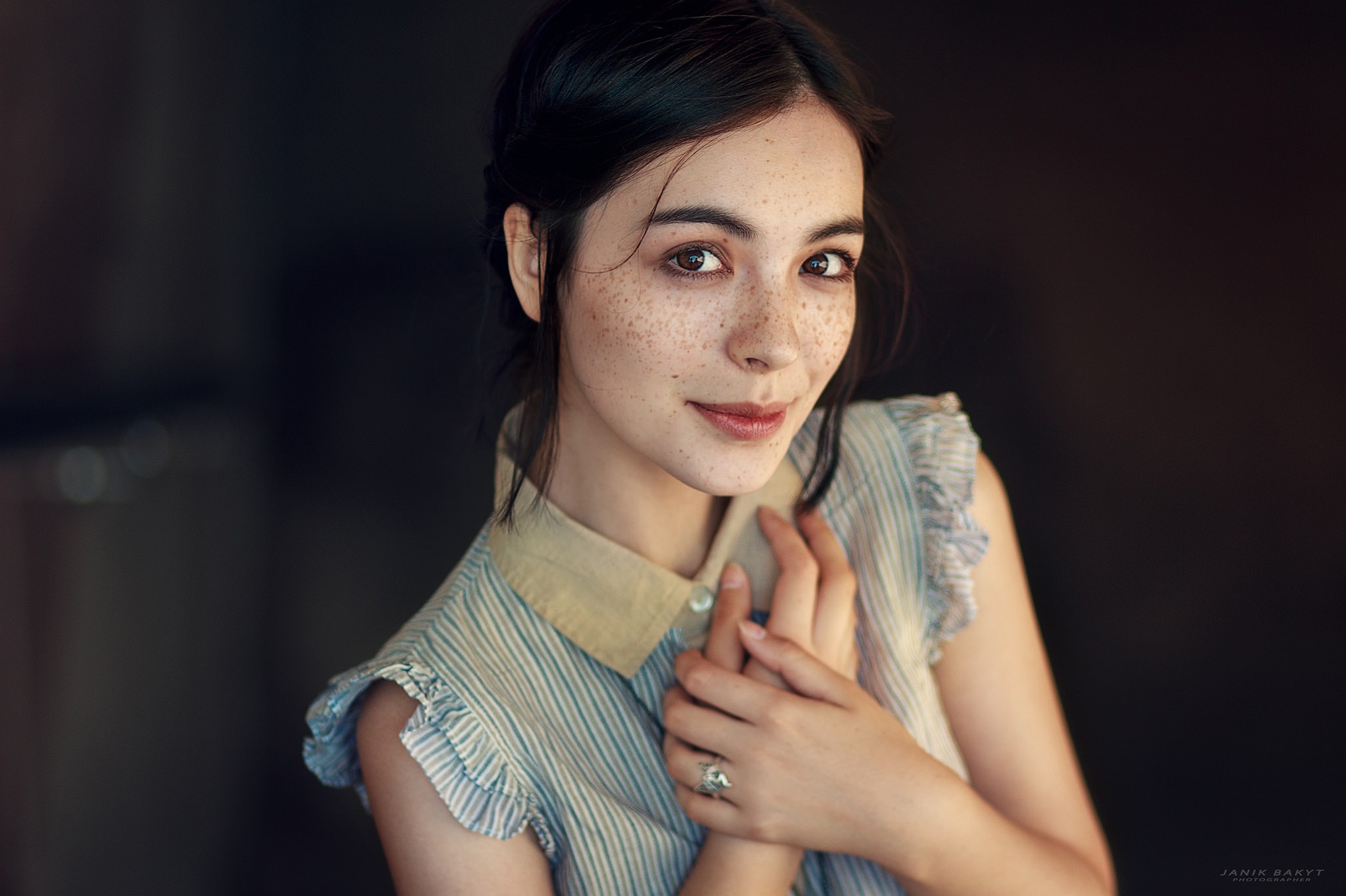 Woman with freckles and brown eyes HD Wallpaper