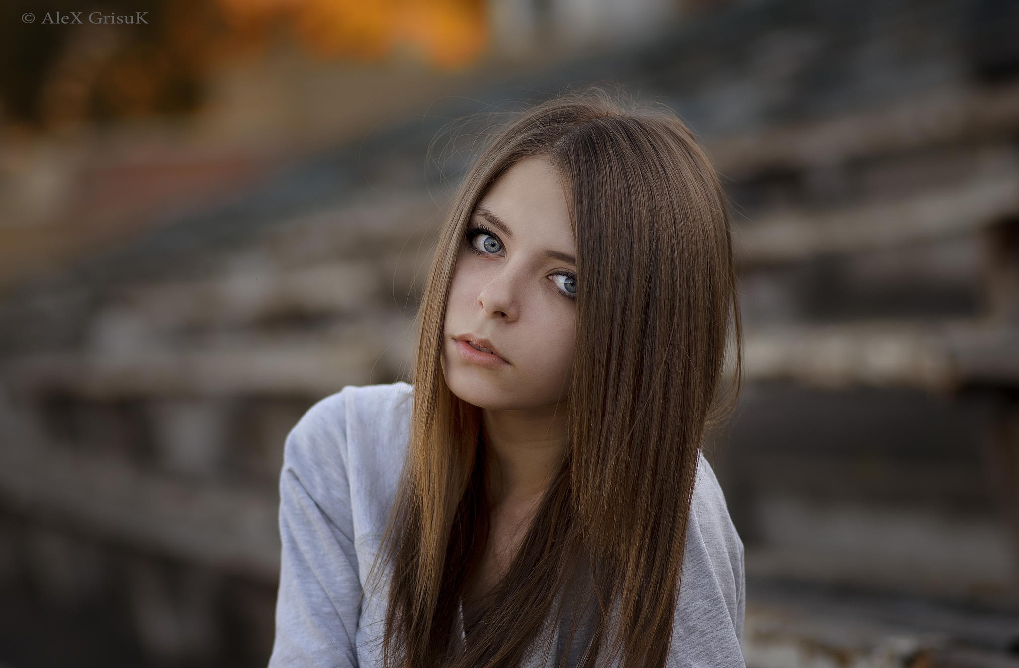 Portrait of a young woman with blue eyes HD Wallpaper