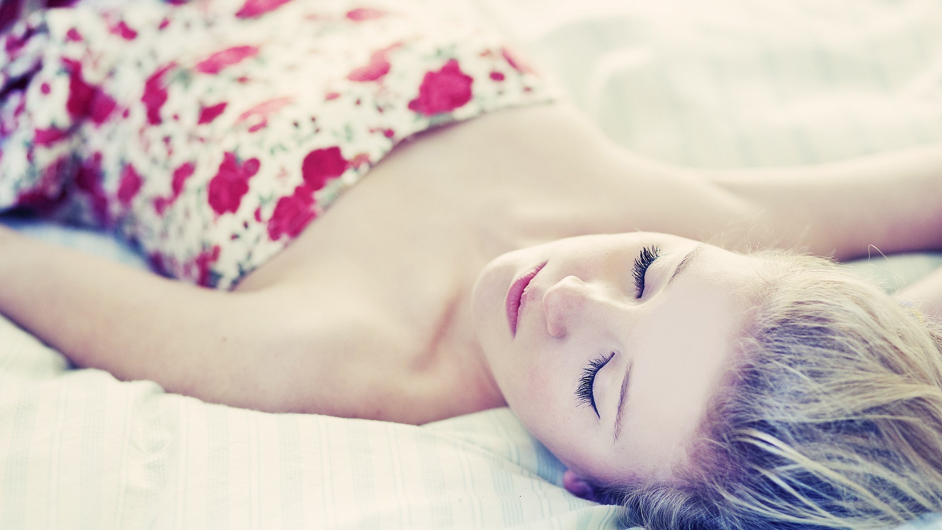 Woman with blonde hair lying on her back HD Wallpaper