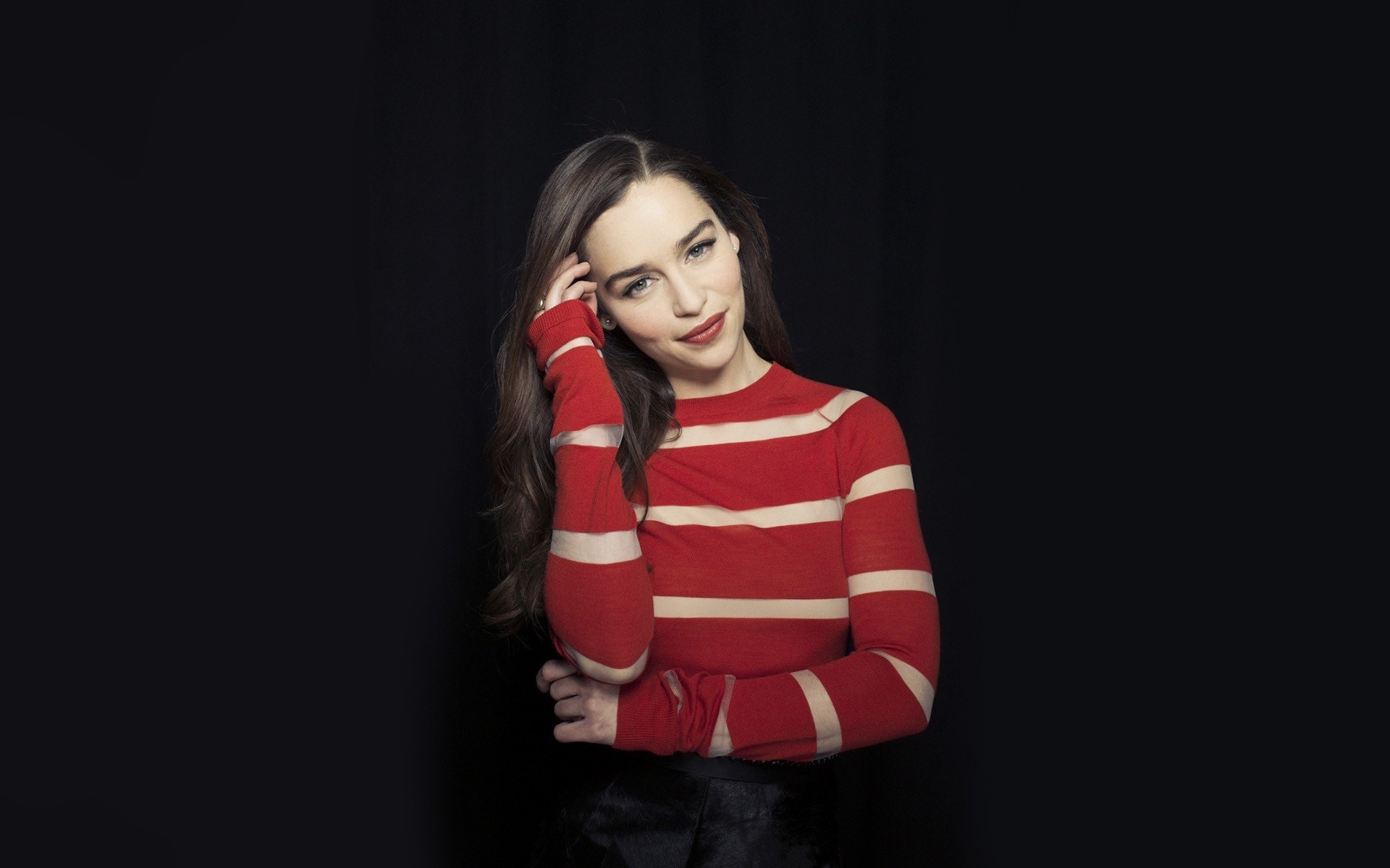 Emilia Clarke with long brown hair wearing a red striped shirt HD Wallpaper