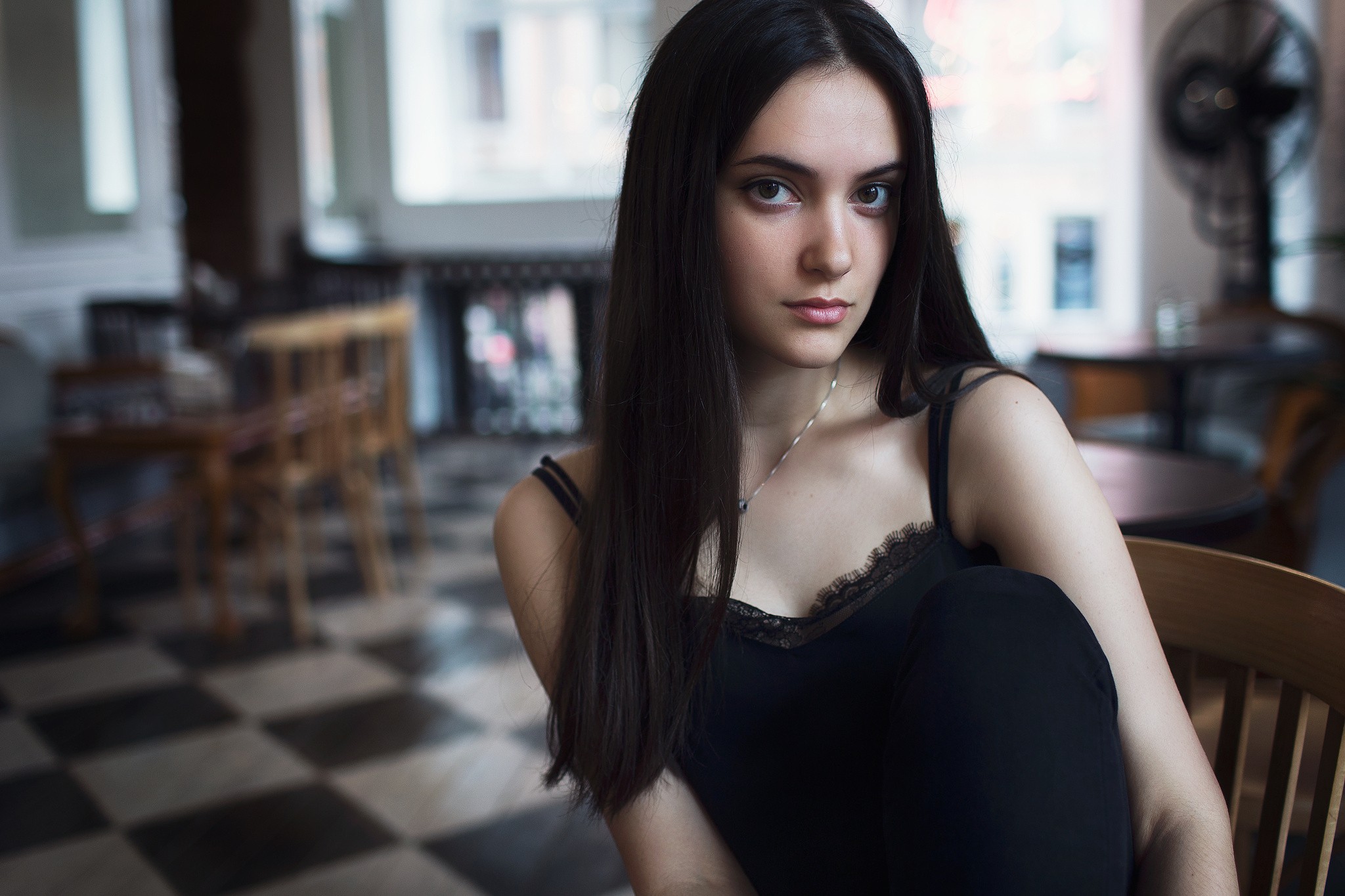 Portrait of a young woman with dark hair HD Wallpaper