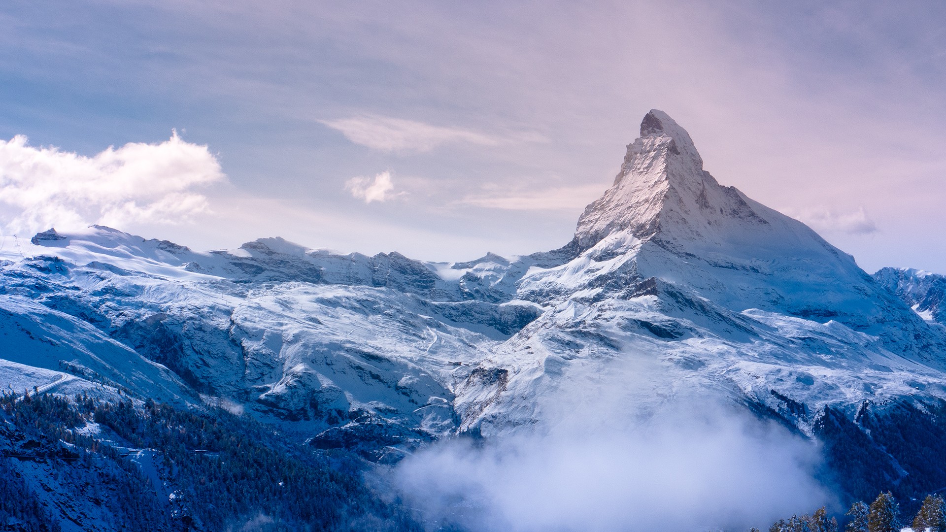 The Matterhorn mountain in the Swiss Alps covered in snow HD Wallpaper