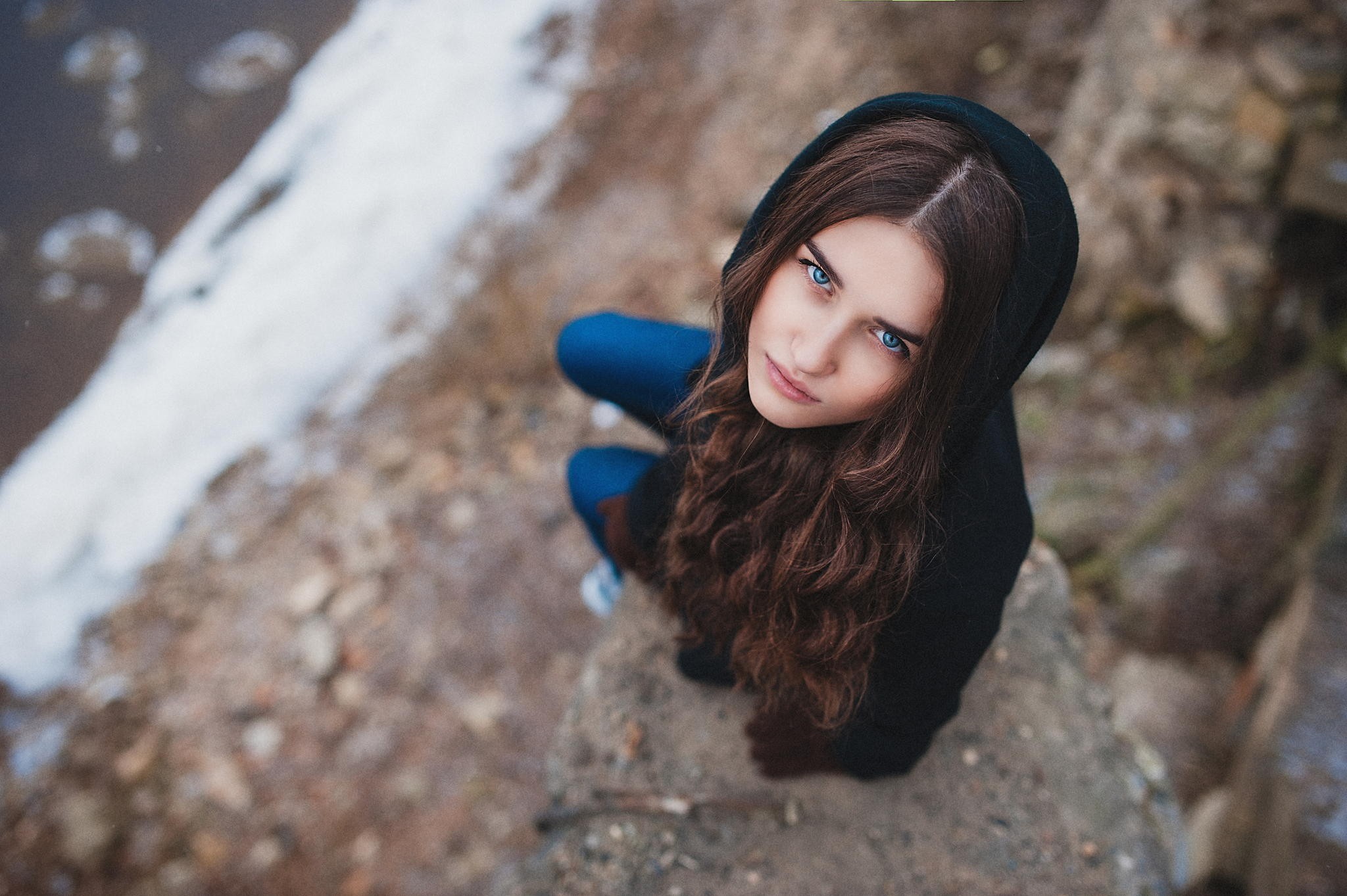 Woman with blue eyes wearing a black hoodie HD Wallpaper