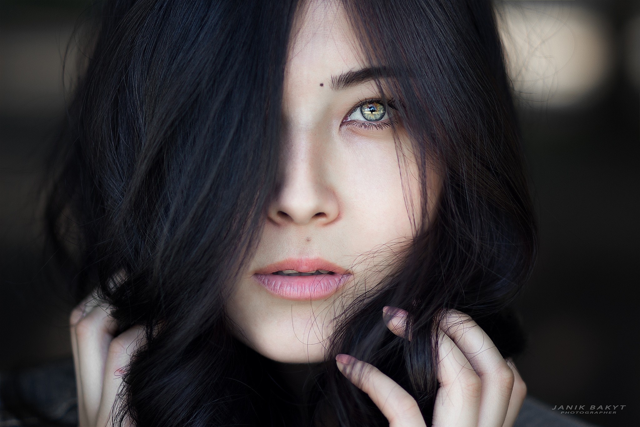 Portrait of a woman with dark hair HD Wallpaper