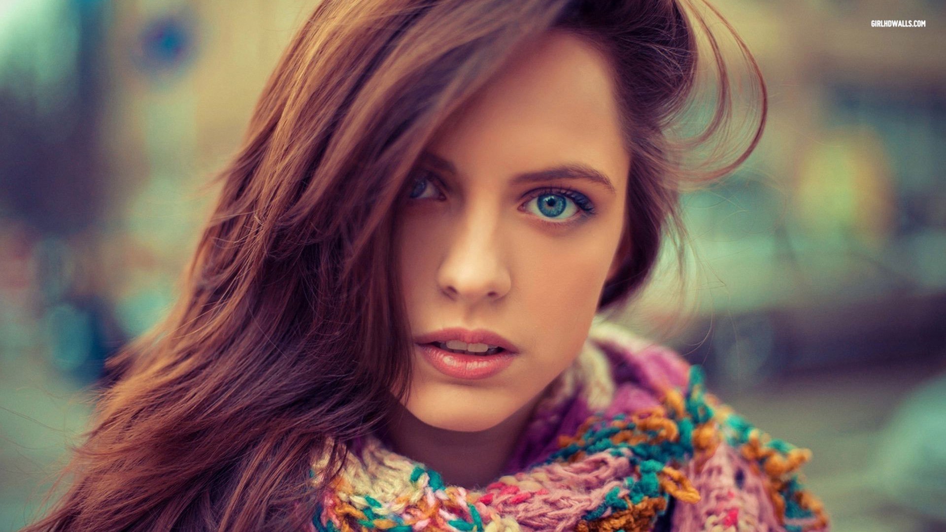 Brunette woman with blue eyes and colorful scarf HD Wallpaper