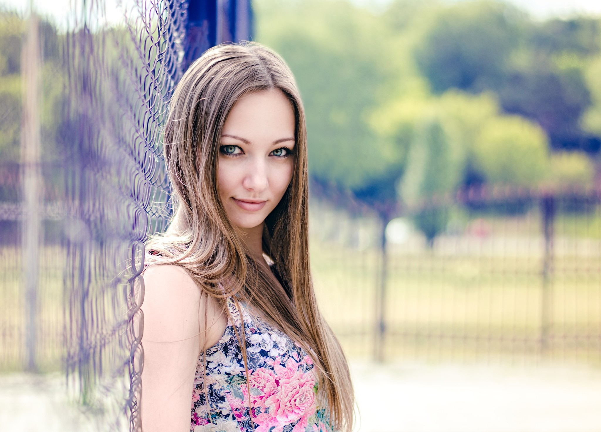 Portrait of a young woman with long brown hair HD Wallpaper