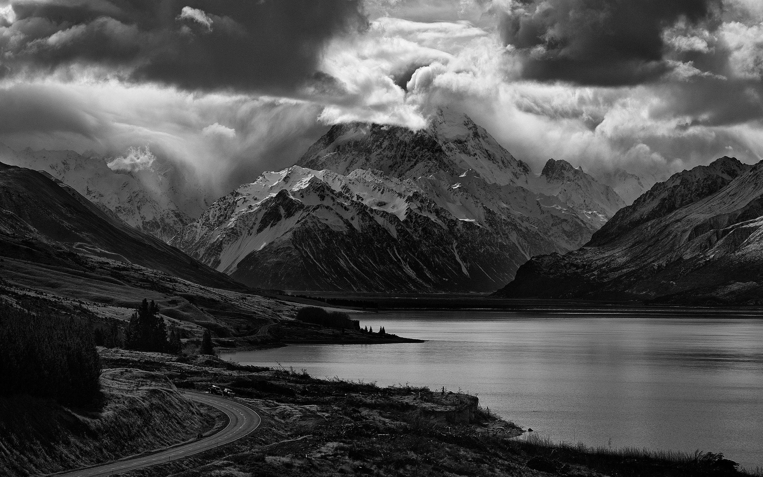 Monochrome landscape of snowy mountains and a lake HD Wallpaper