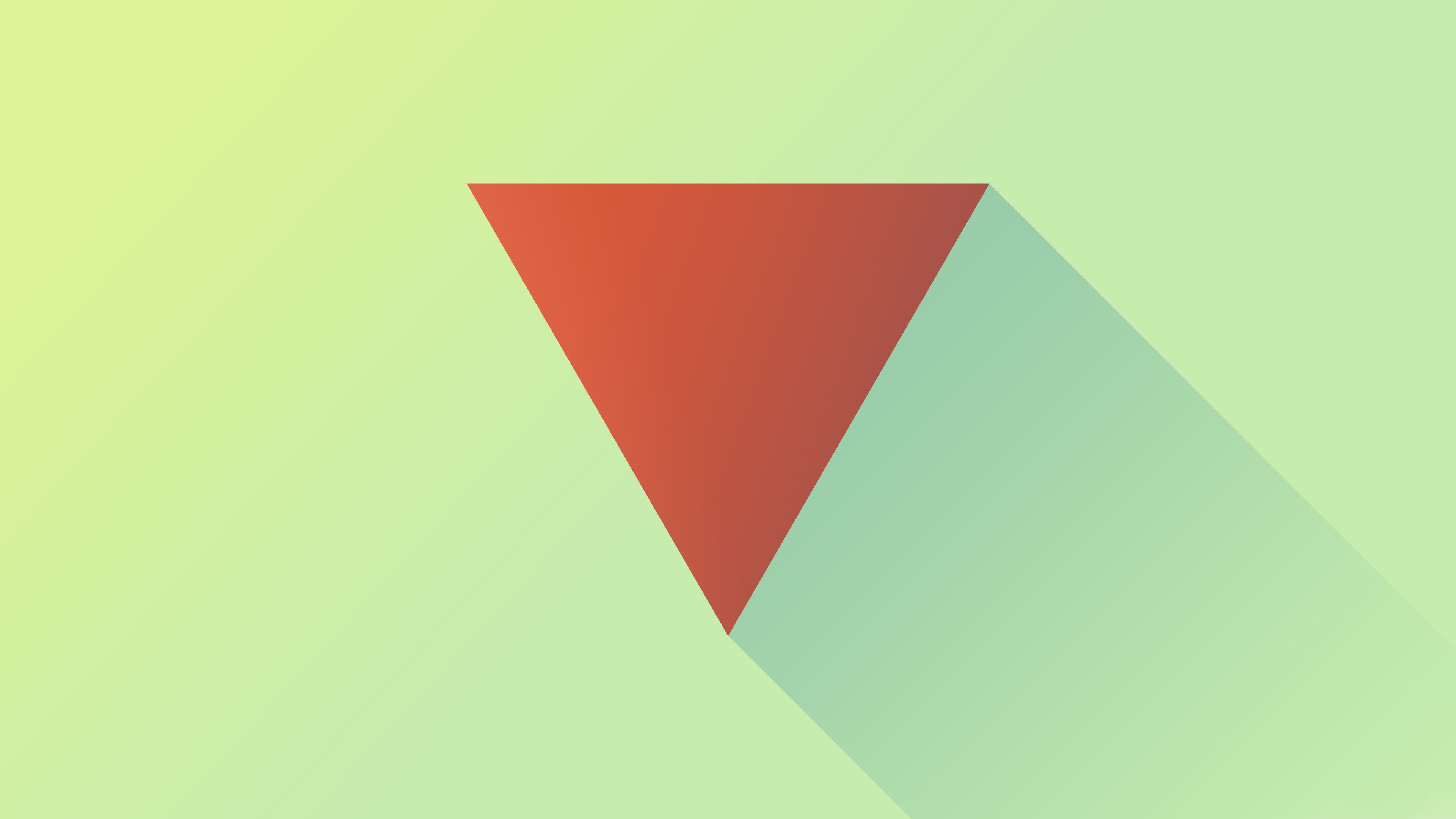 Red triangle casting a long shadow HD Wallpaper