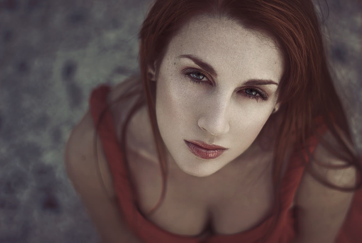 Redhead woman with freckles looking up HD Wallpaper
